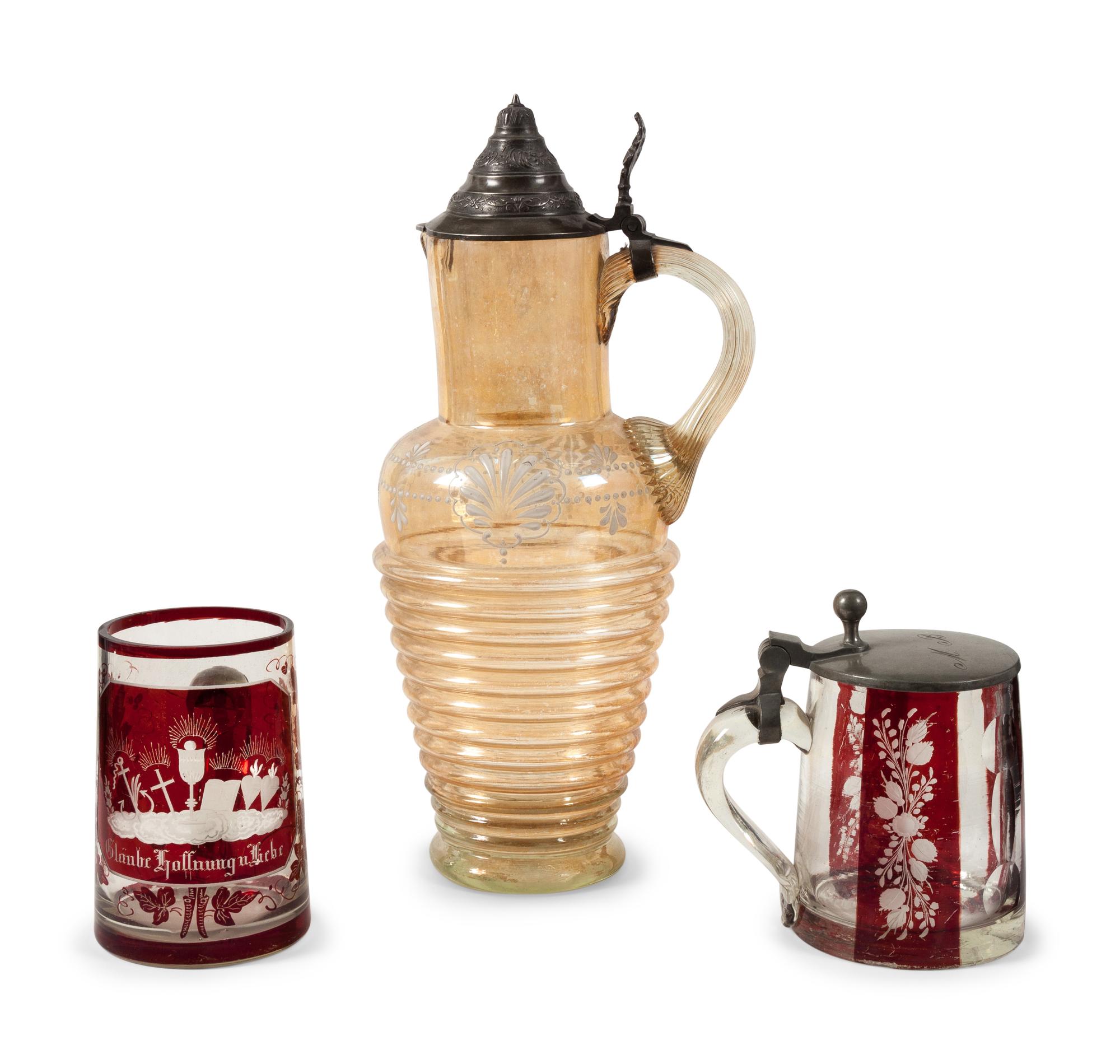 A Collection of Steins and a Large Pitcher