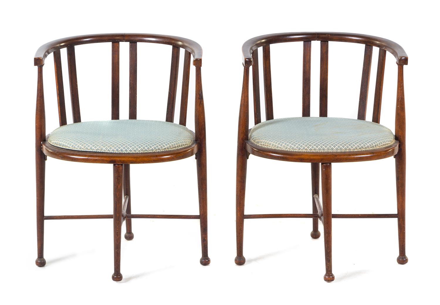 A Pair of Barrel-Back Armchairs