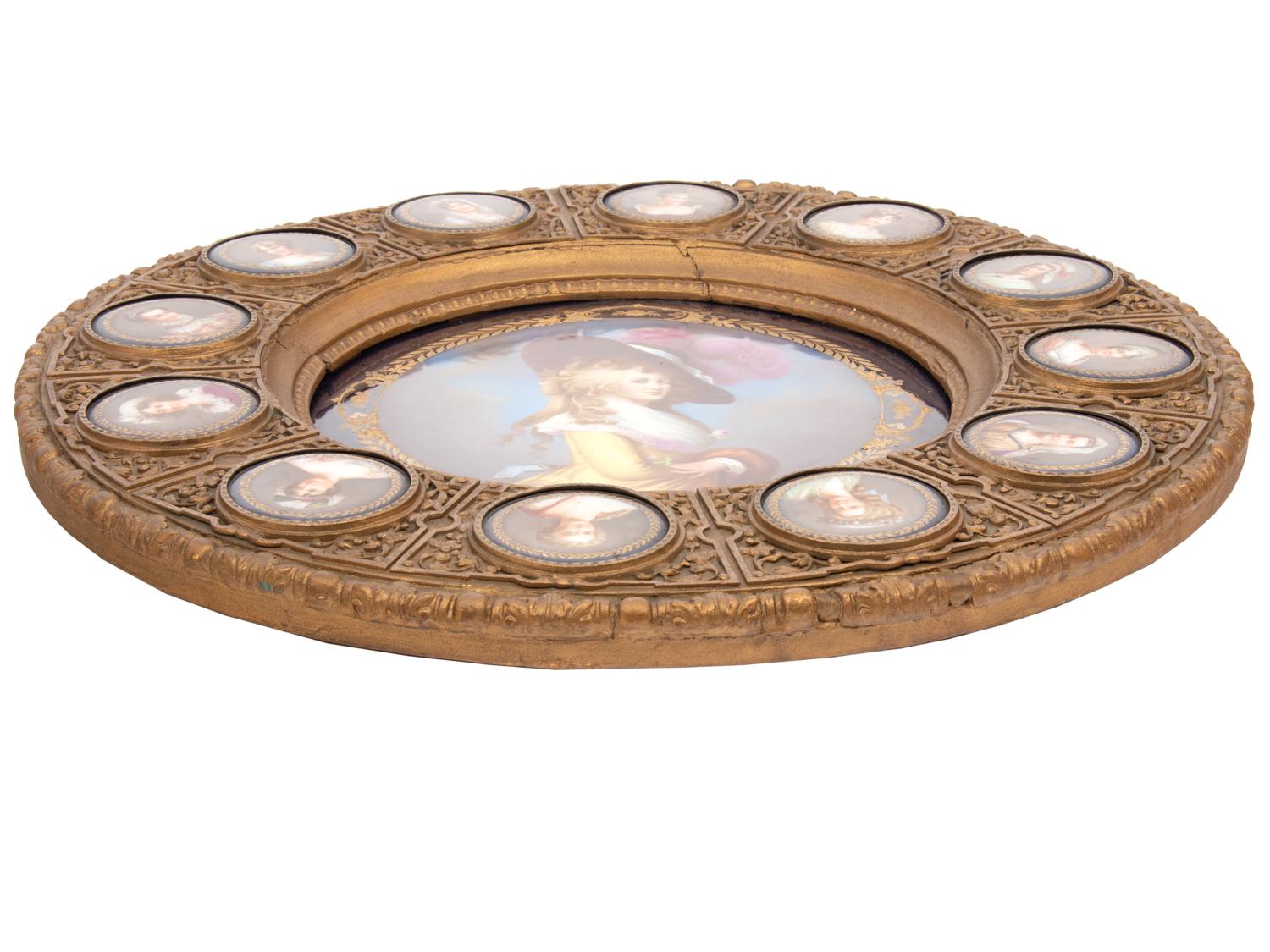 A Continental Porcelain Portrait and a Set of Twelve Similar Medallions in a Gilt Bronze Plaque