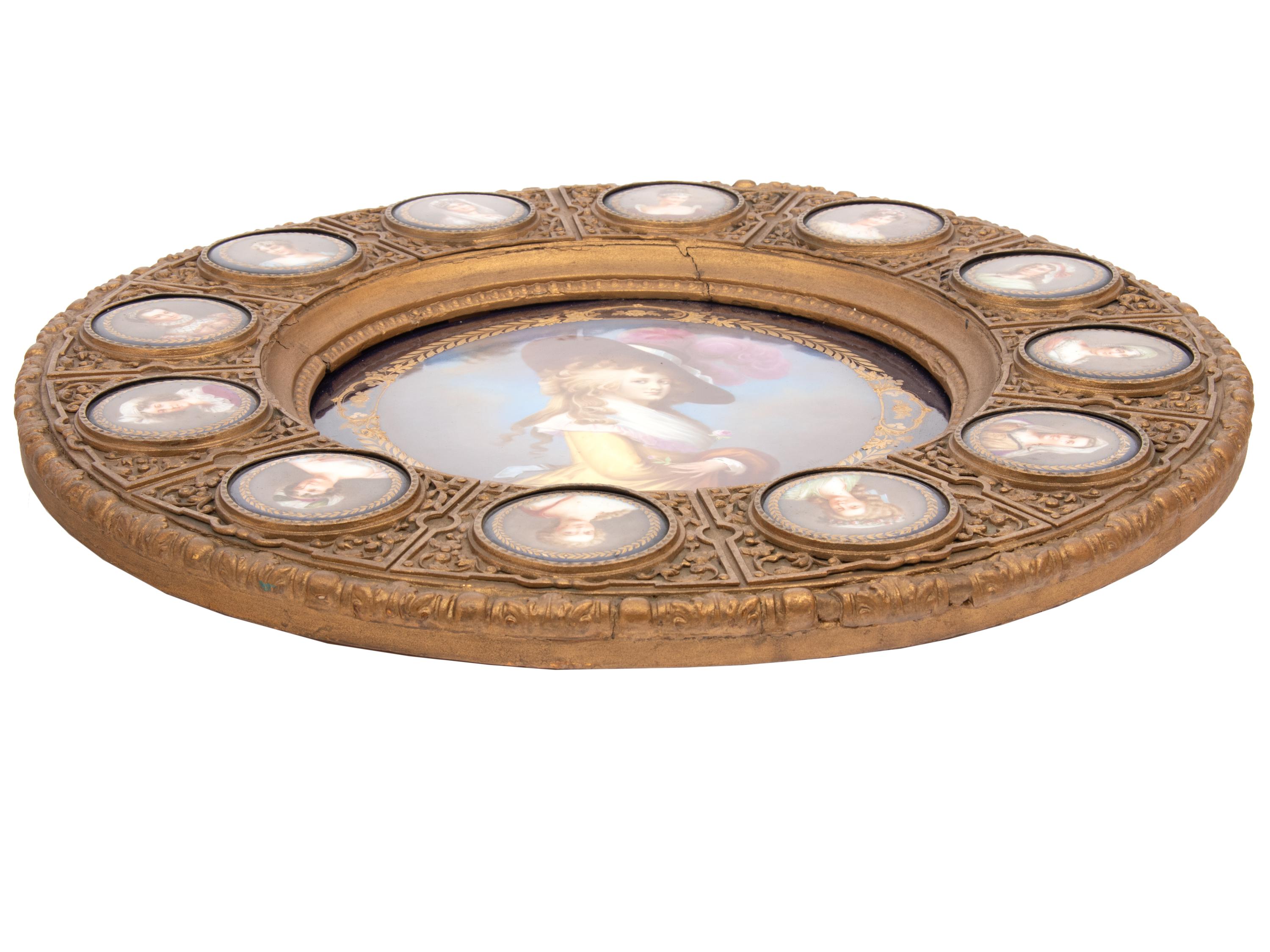 A Continental Porcelain Portrait and a Set of Twelve Similar Medallions in a Gilt Bronze Plaque