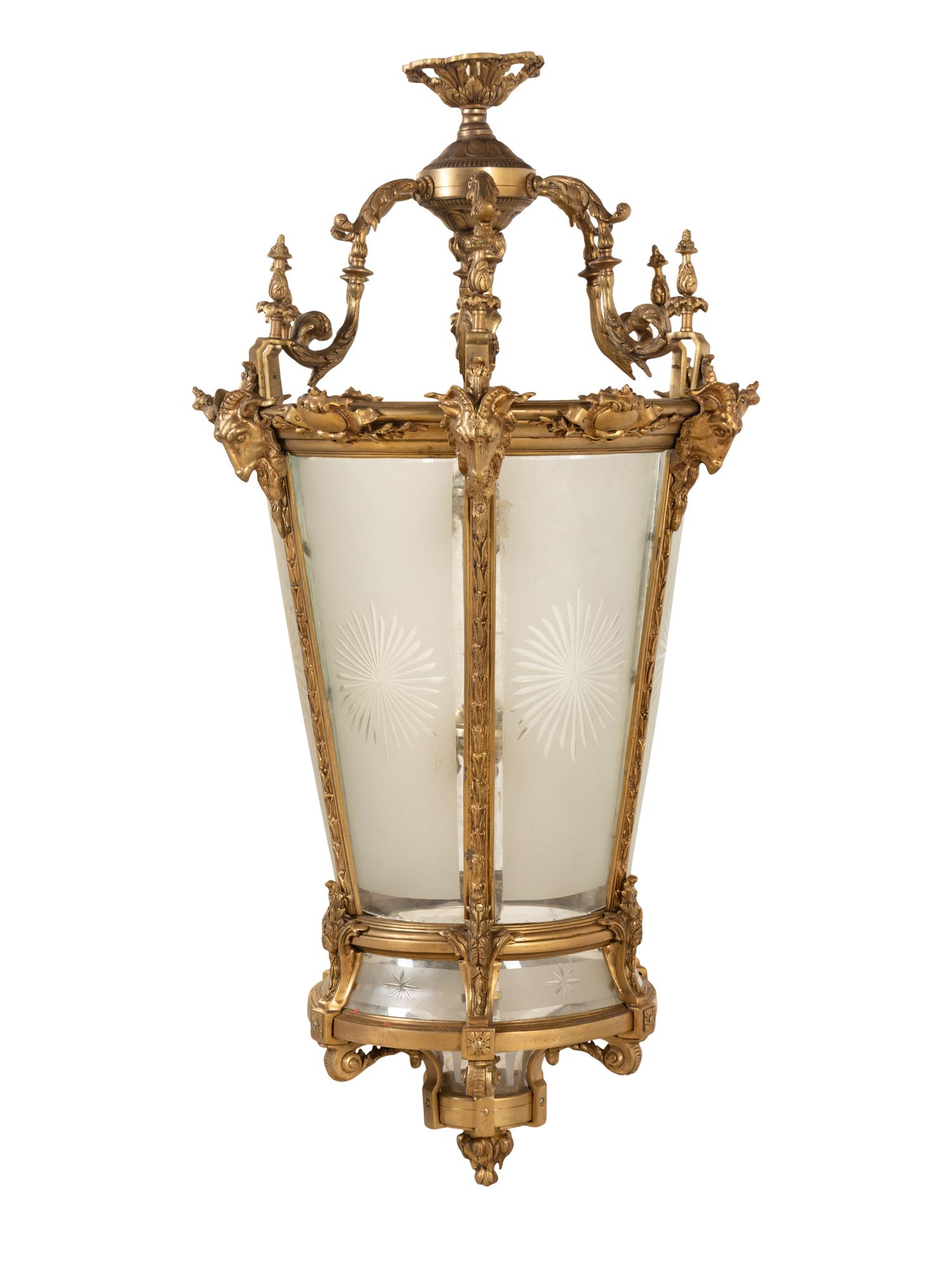 A Pair of Louis XVI Style Gilt Bronze and Frosted Glass Hall Lanterns
