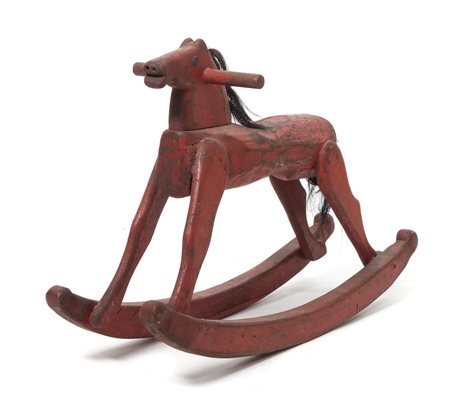 A Vintage Painted Wood Rocking Horse Height 19 x length 29 inches.