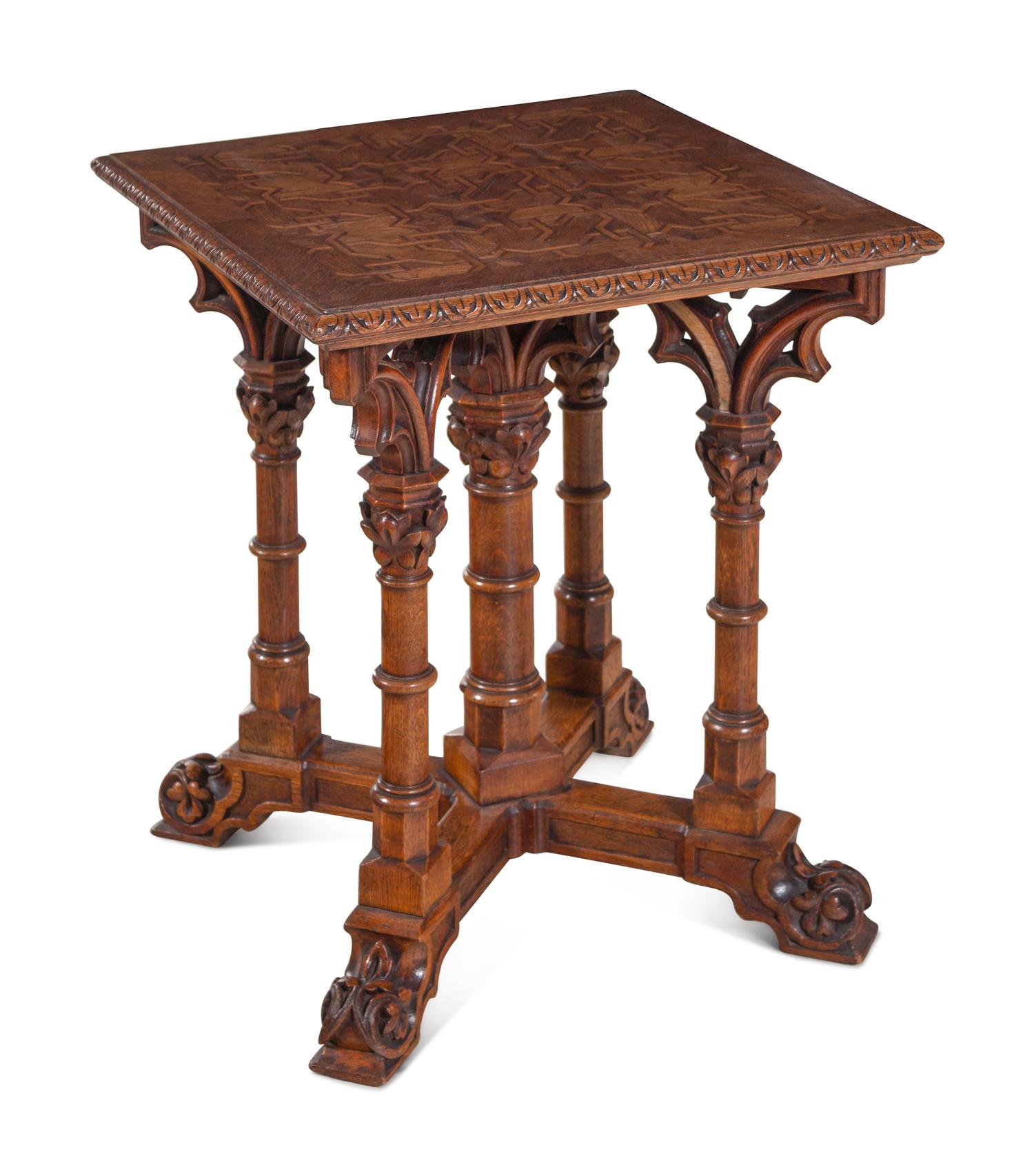 A Gothic Revival Walnut and Oak Parquetry Center Table by L. & S. Lövinson (German, active 19th Century)