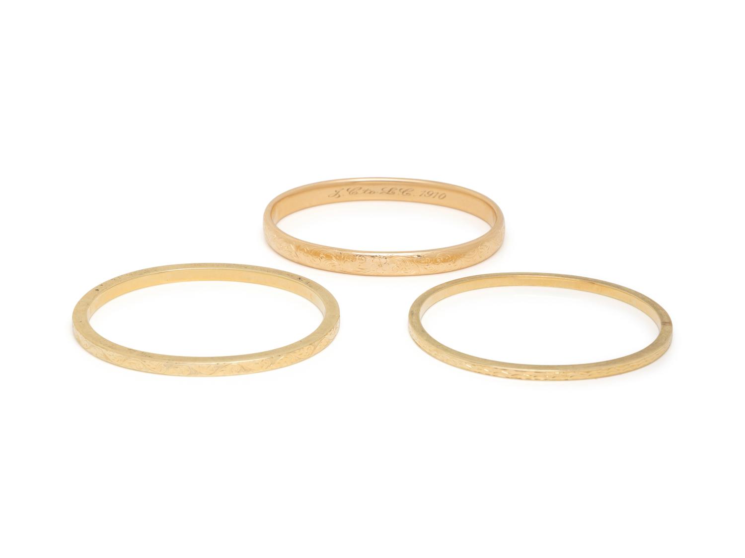 COLLECTION OF YELLOW GOLD BANGLE BRACELETS