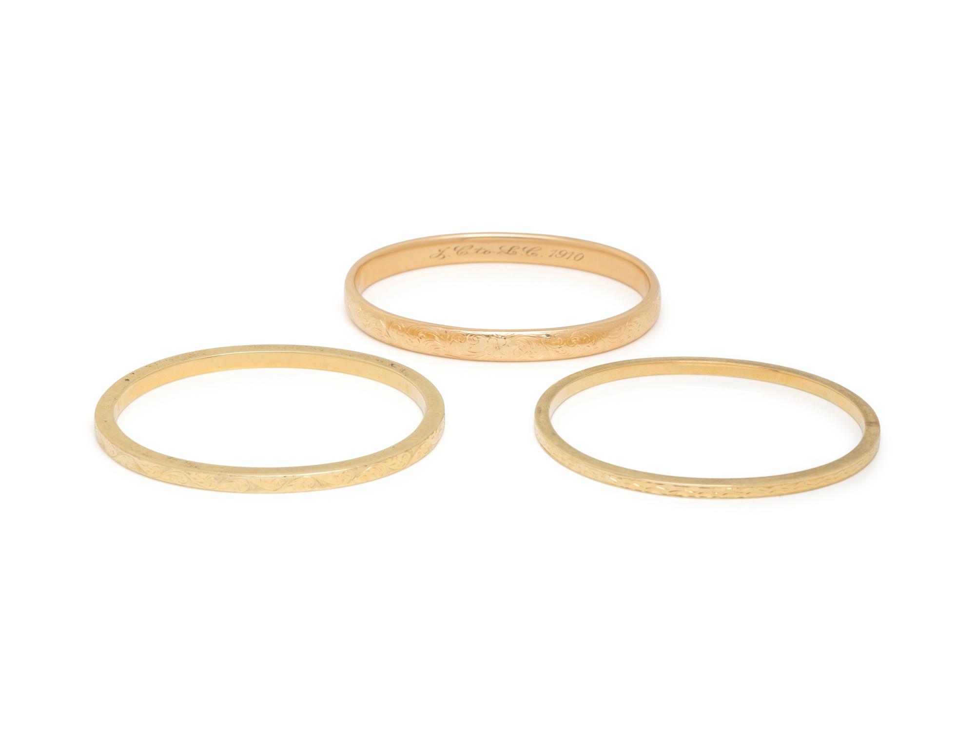 COLLECTION OF YELLOW GOLD BANGLE BRACELETS