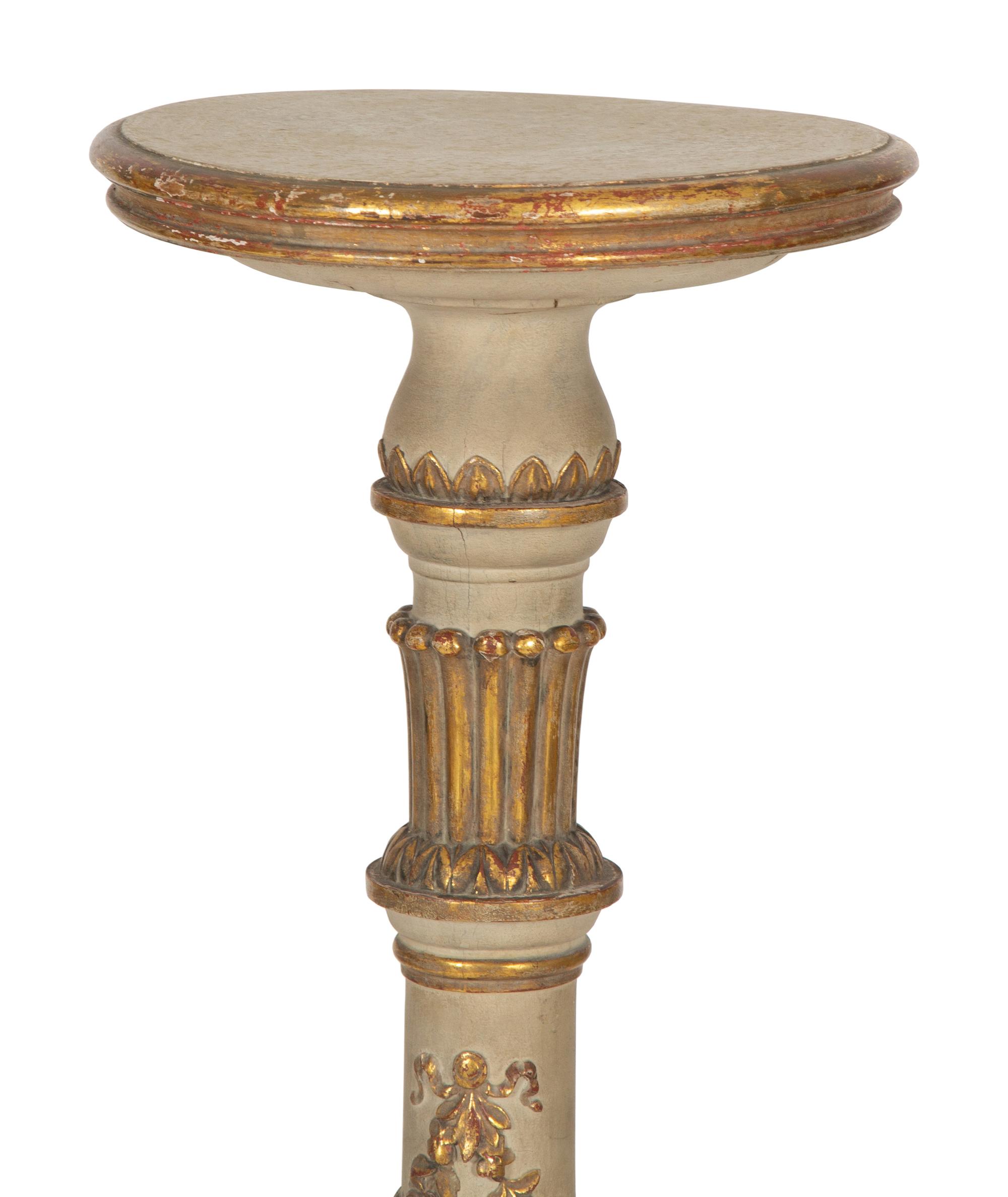 A Pair of Louis XV Style Painted and Parcel Gilt Pedestals