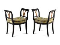 A Pair of Neoclassical Ebonized Curule Benches