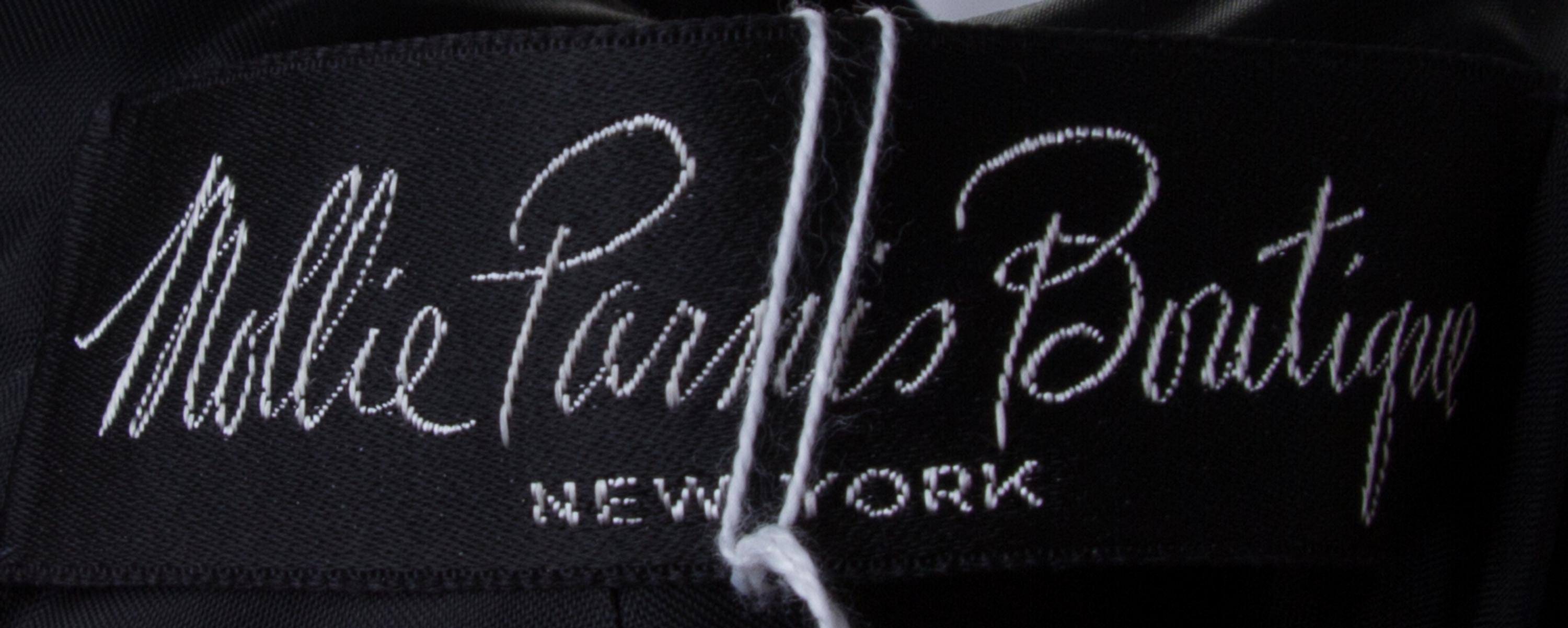 A Mollie Parnis Black Velvet Gown, Size 8.