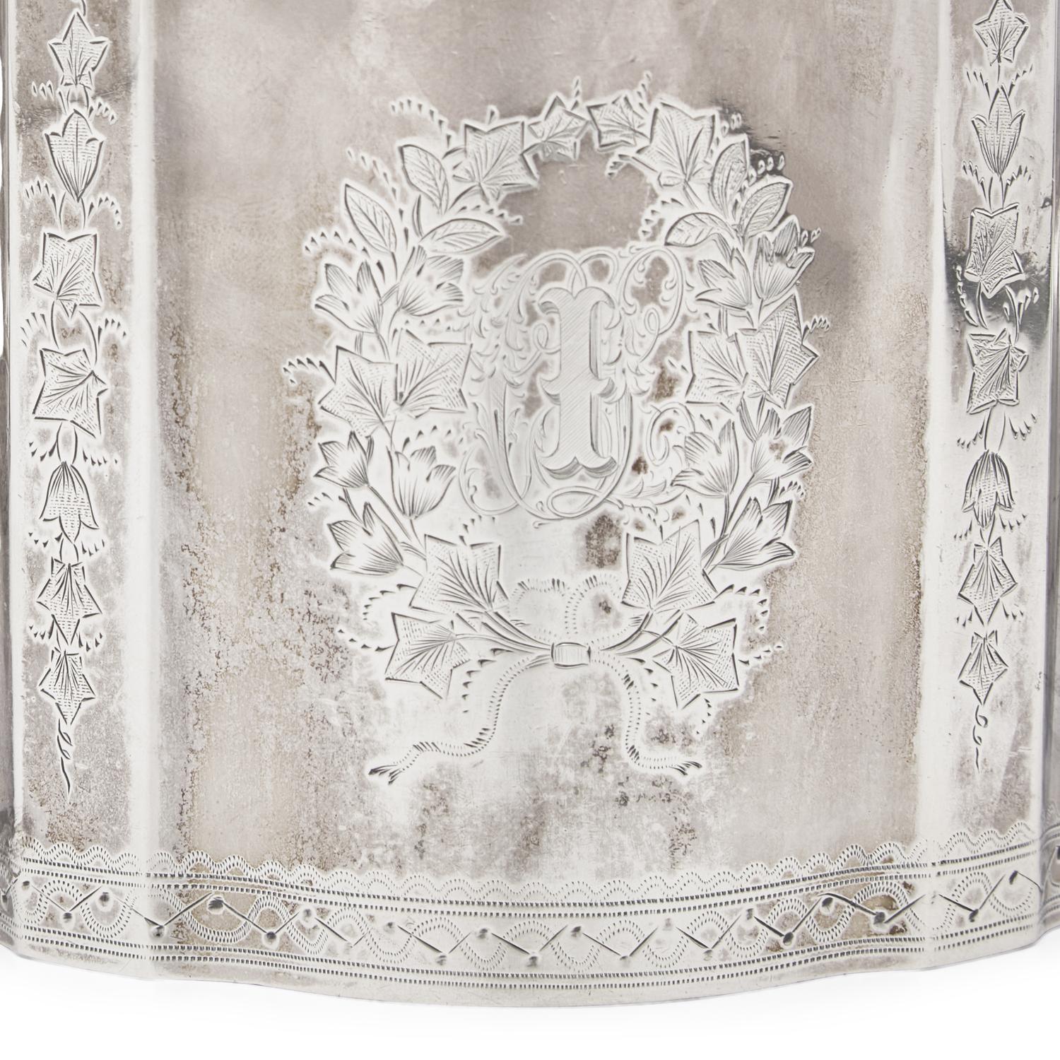 A Three-Piece Coin Silver Tea Service