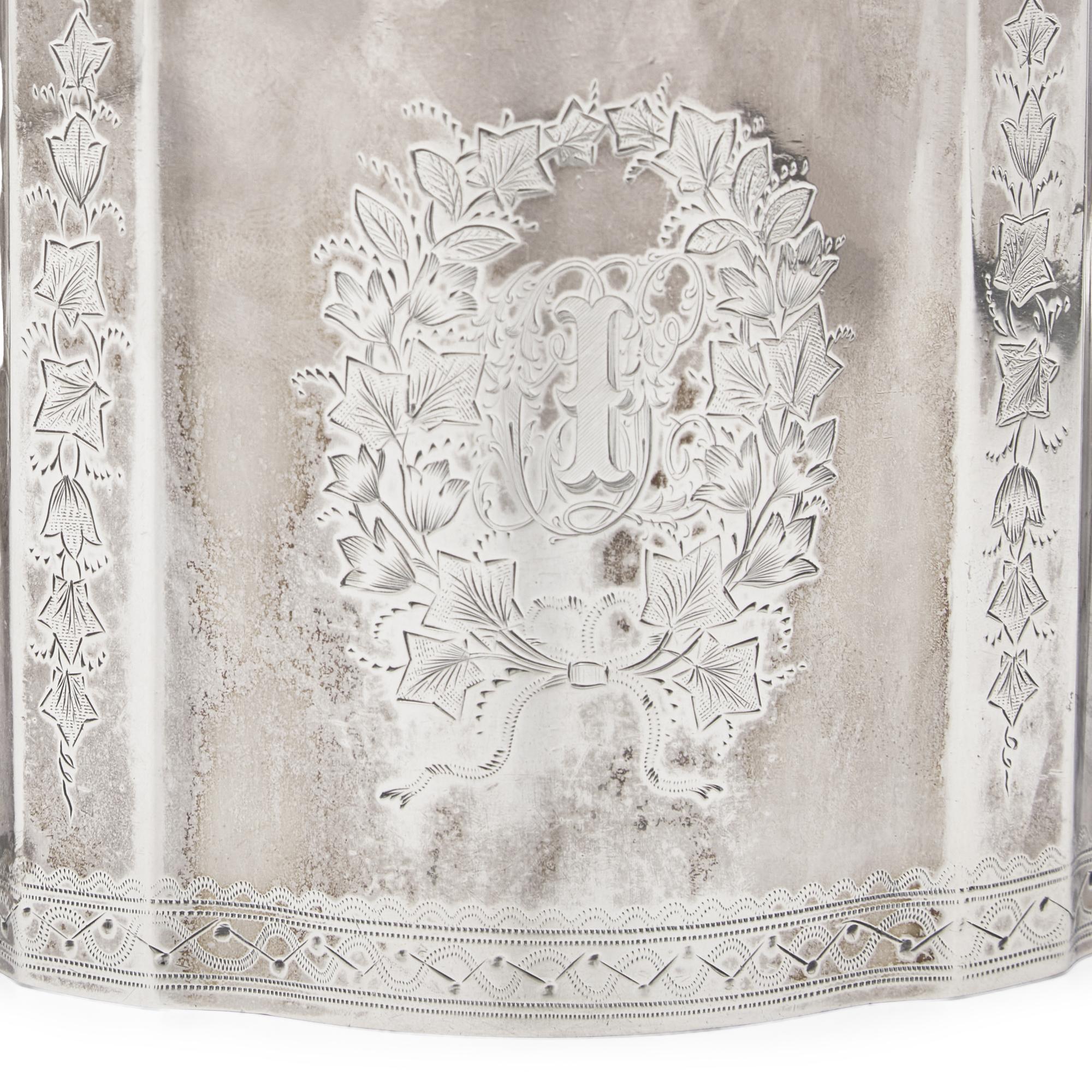A Three-Piece Coin Silver Tea Service