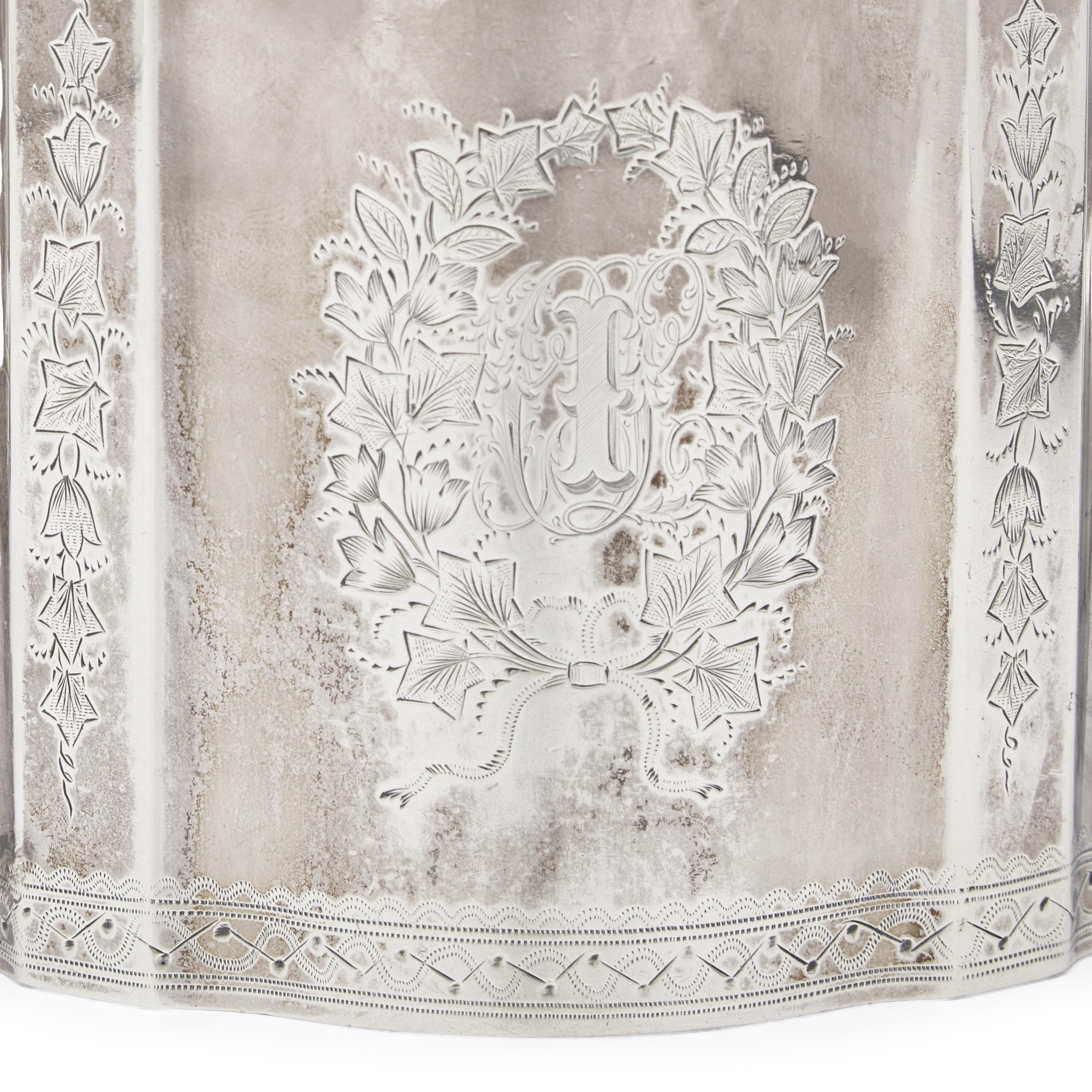 A Three-Piece Coin Silver Tea Service