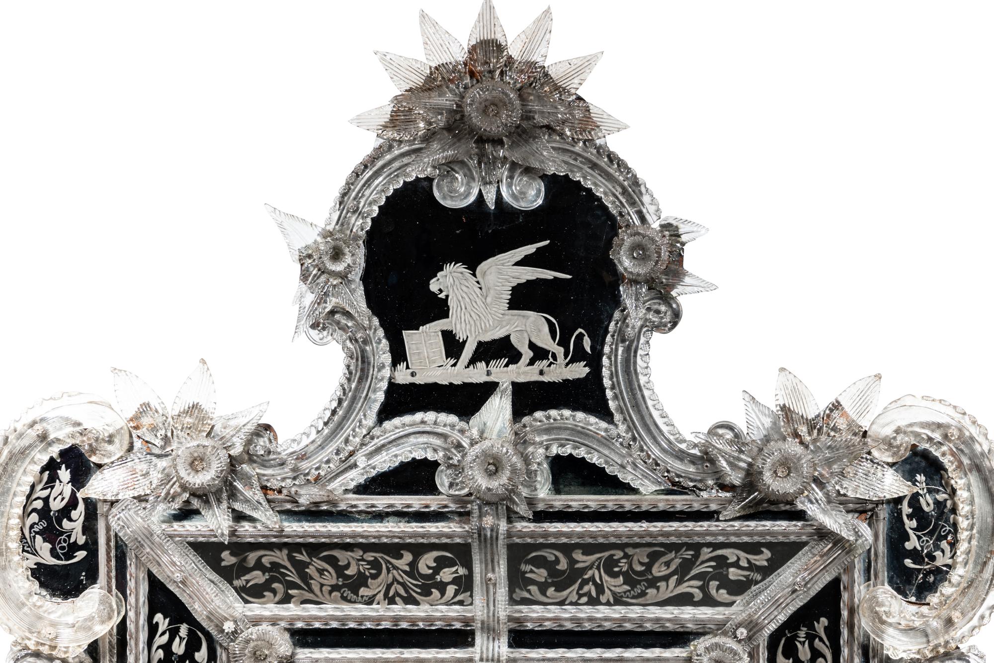 A Venetian Blown and Etched Glass Mirror