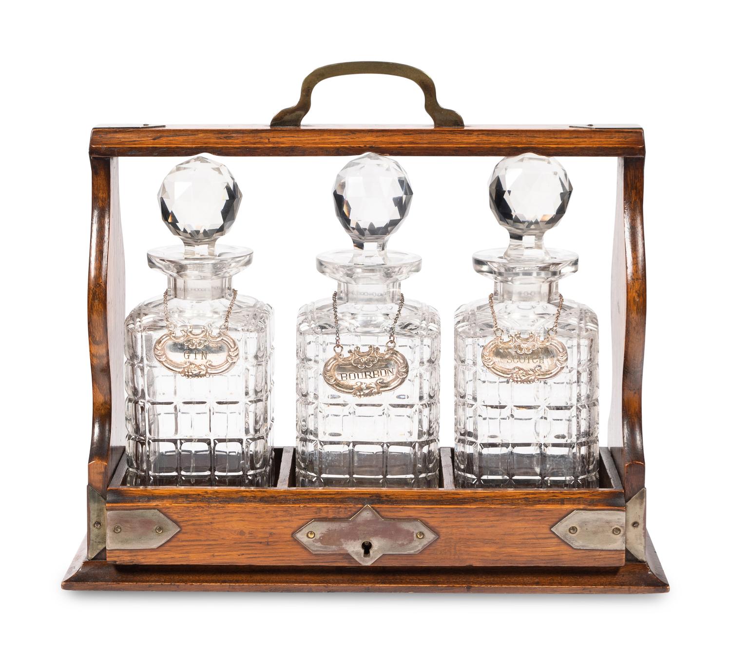 An English Oak and Cut Glass Tantalus