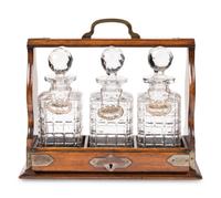 An English Oak and Cut Glass Tantalus
