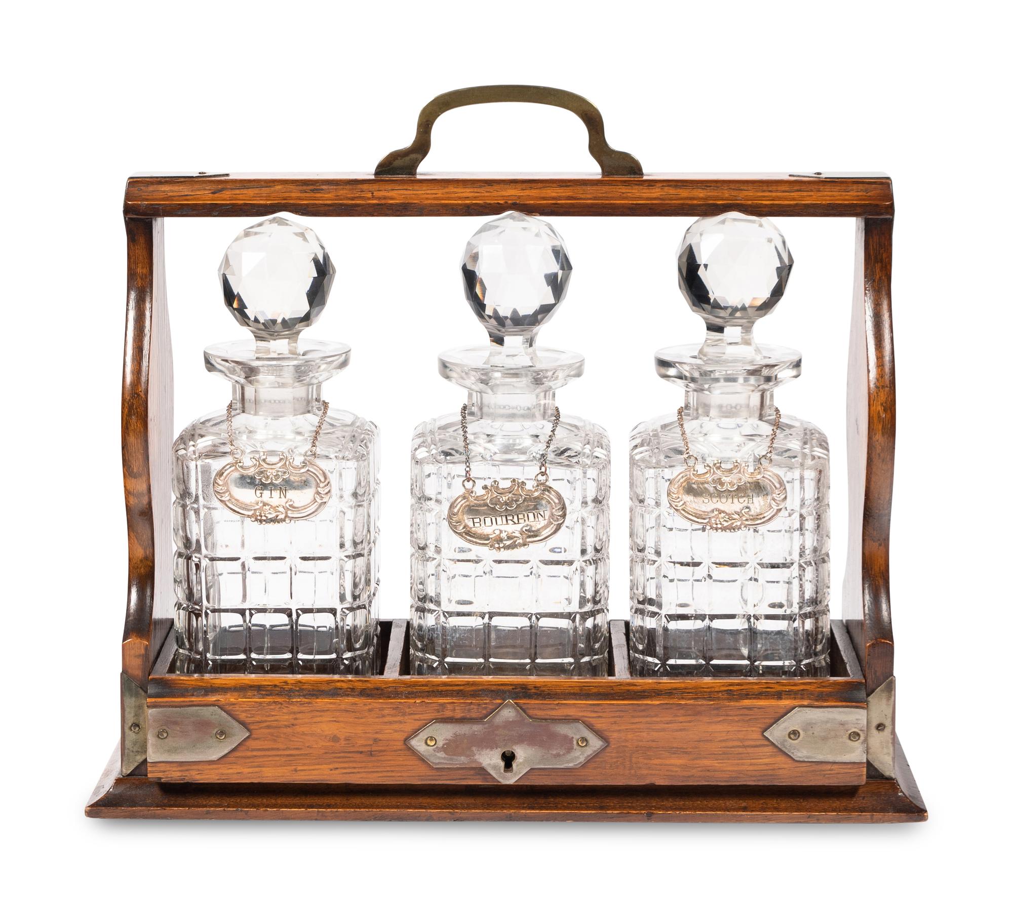 An English Oak and Cut Glass Tantalus