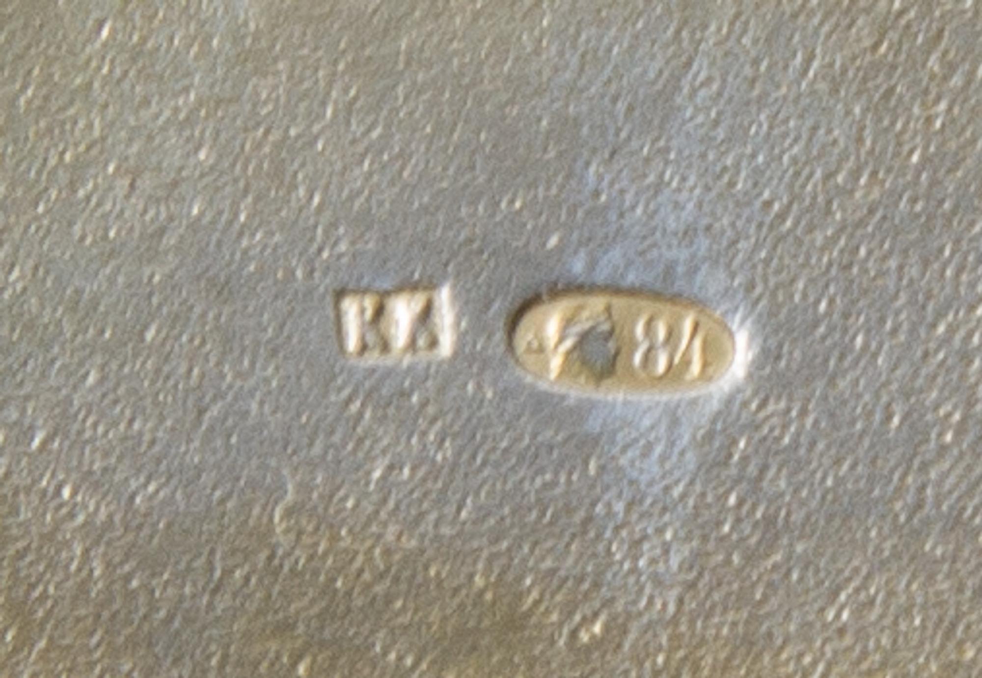 A Russian Silver Cigarette Case, Makers mark KK, Moscow, the lid worked to show a winter landscape centered by riders in a troika, havi