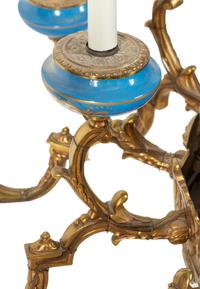 A Sèvres Style Painted Glass and Gilt Metal Mounted Eighteen-Light Chandelier