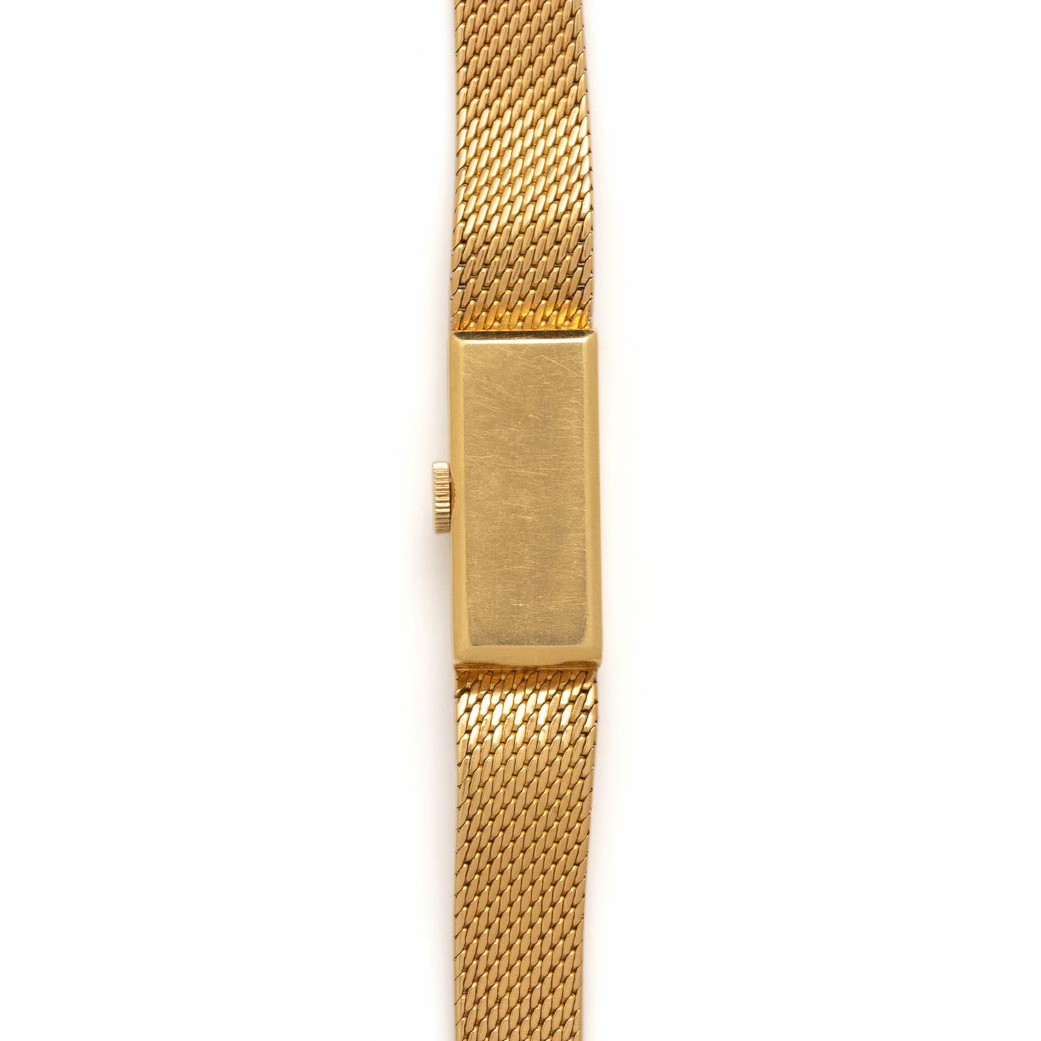 GÜBELIN, 18K YELLOW GOLD WATCH