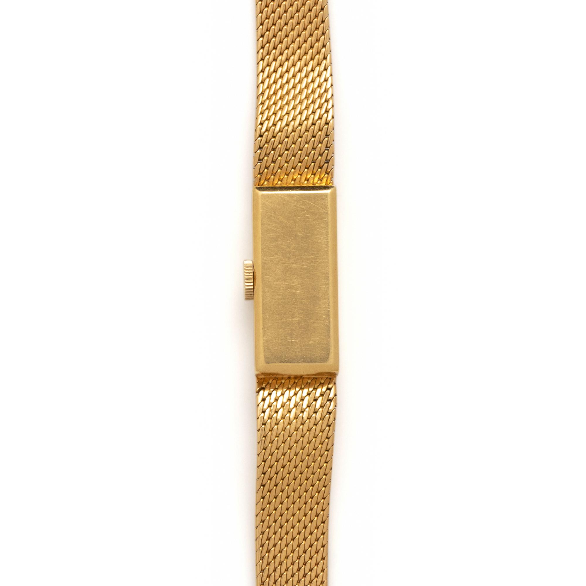 GÜBELIN, 18K YELLOW GOLD WATCH