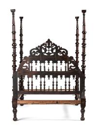 A Gothic Revival Walnut Four Poster Bed