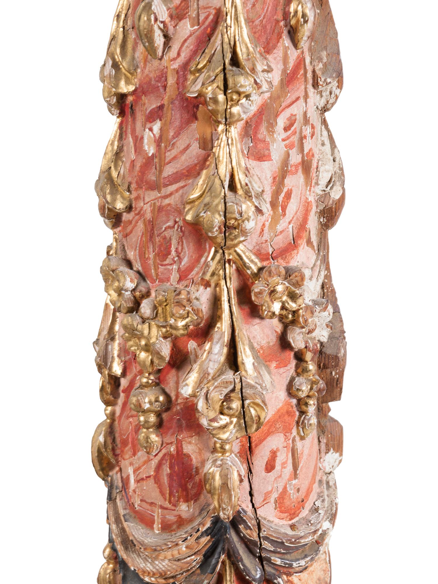 A Pair of Spanish Painted and Parcel Gilt Solomonic Columns