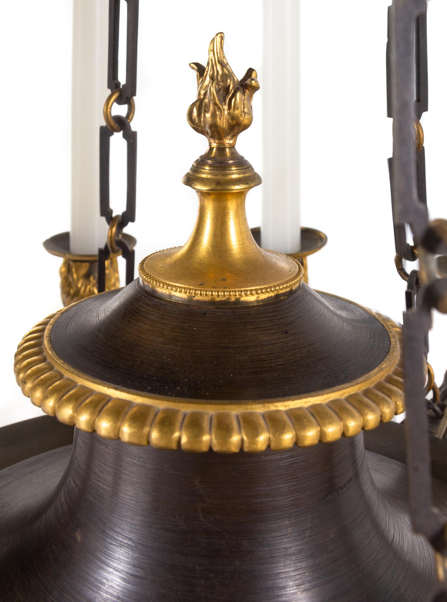 A Restauration Gilt and Patinated Bronze Twelve-Light Chandelier