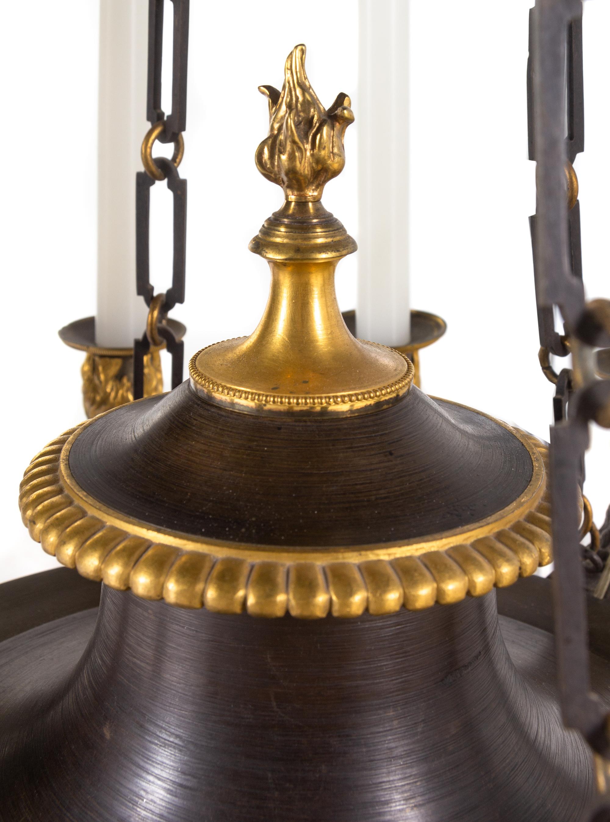 A Restauration Gilt and Patinated Bronze Twelve-Light Chandelier