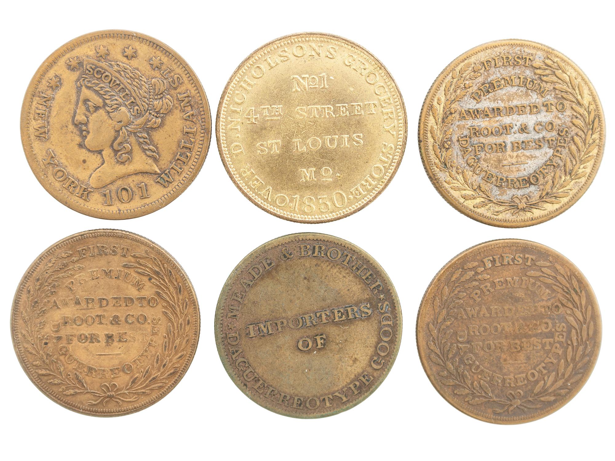 [EARLY PHOTOGRAPHY]. A group of daguerreian tokens incl. Meade Bros., Root & Co., Fitzgibbon, and others.