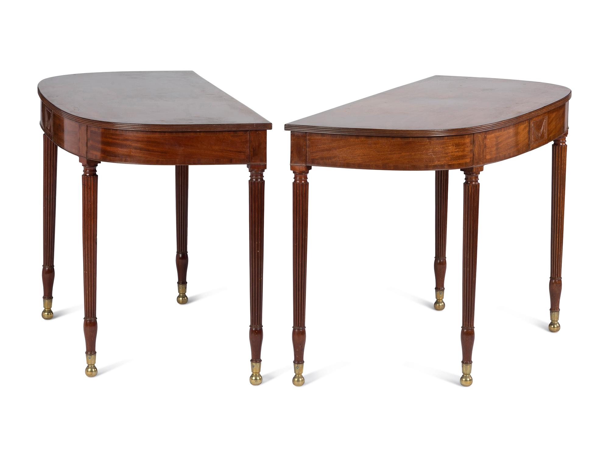 A Pair of Federal Brass-Mounted, Carved and Crossbanded Mahogany Console Tables