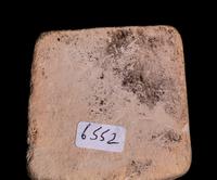 An Egyptian Limestone Case in the Form of an Obelisk with Osiris and Isis