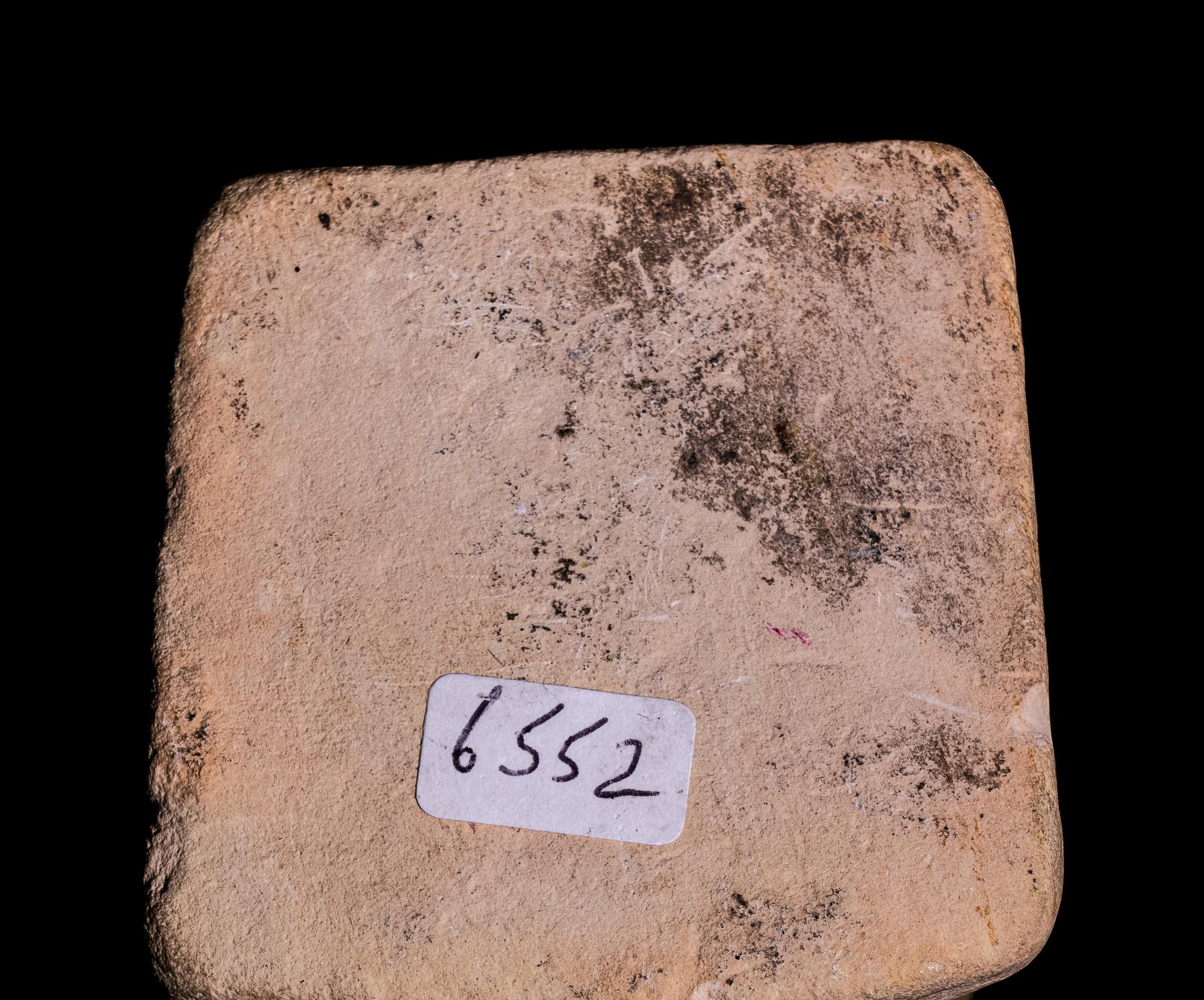 An Egyptian Limestone Case in the Form of an Obelisk with Osiris and Isis