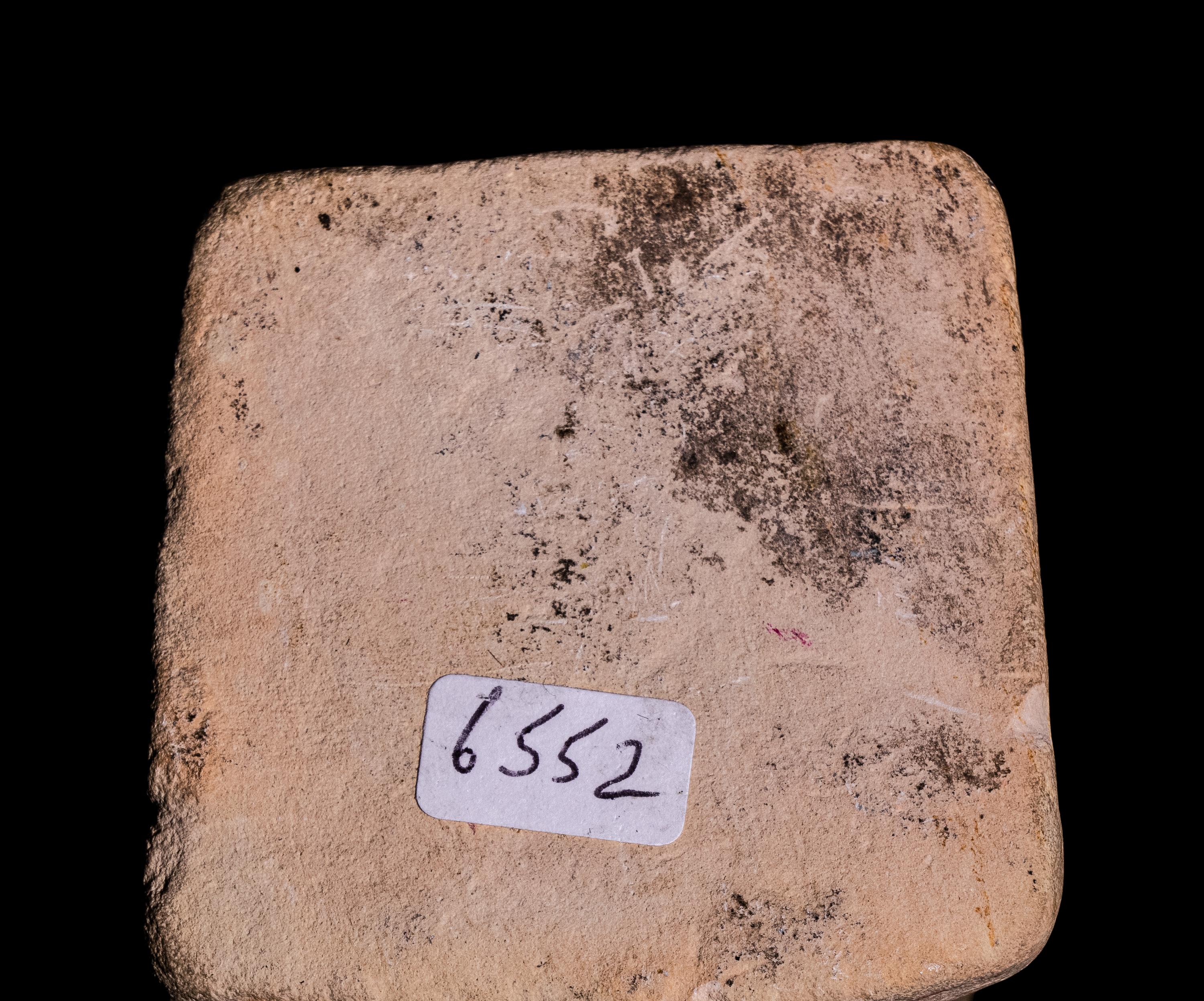 An Egyptian Limestone Case in the Form of an Obelisk with Osiris and Isis