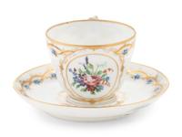 A Nicholas II Imperial Porcelain Factory Teacup and Saucer