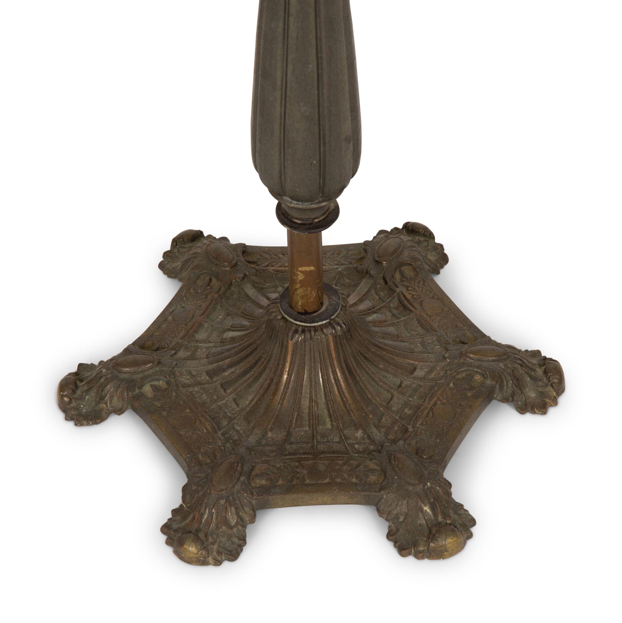 A Pair of Patinated Metal Lantern Style Floor Lamps