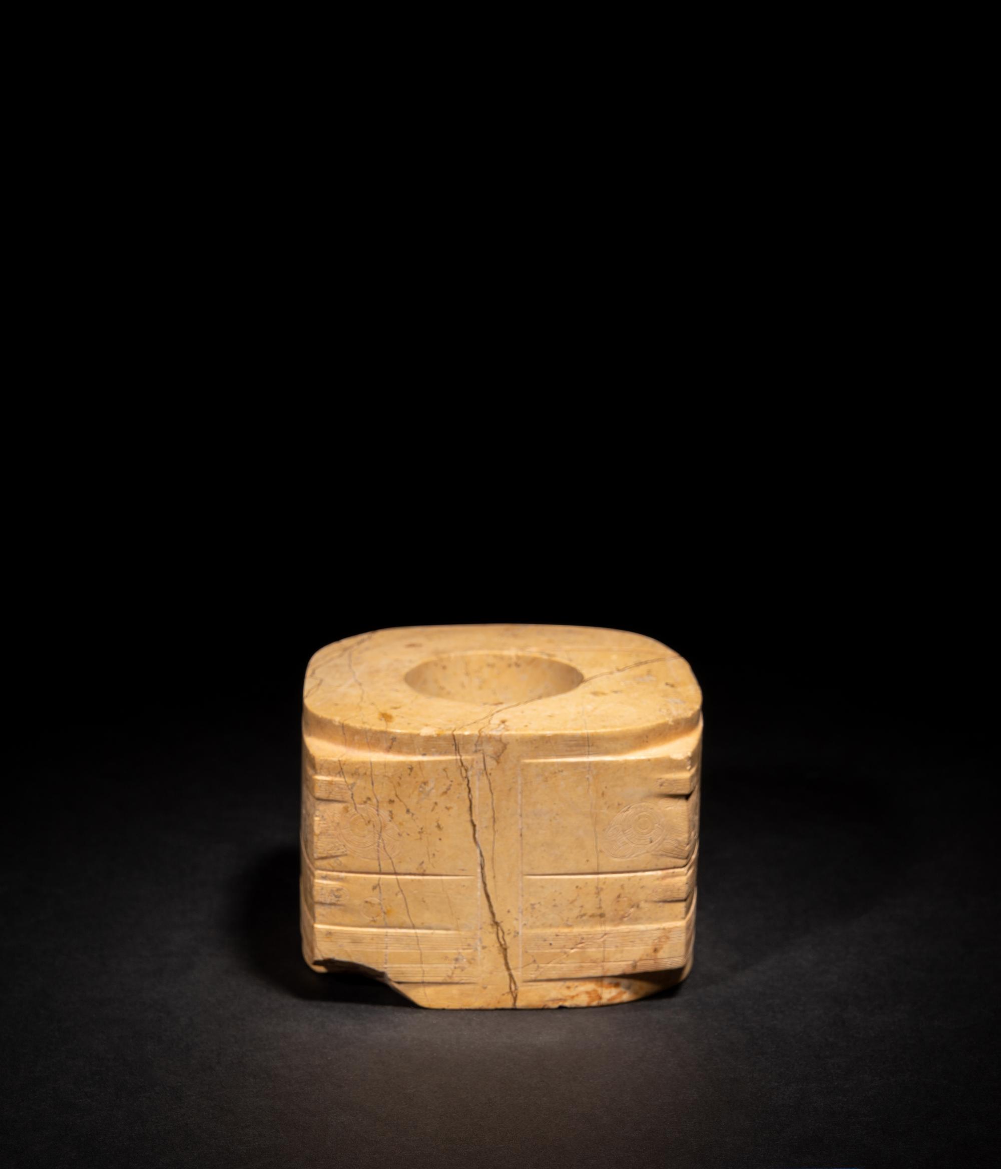 A Chinese Archaistic Chicken Bone Jade Cong