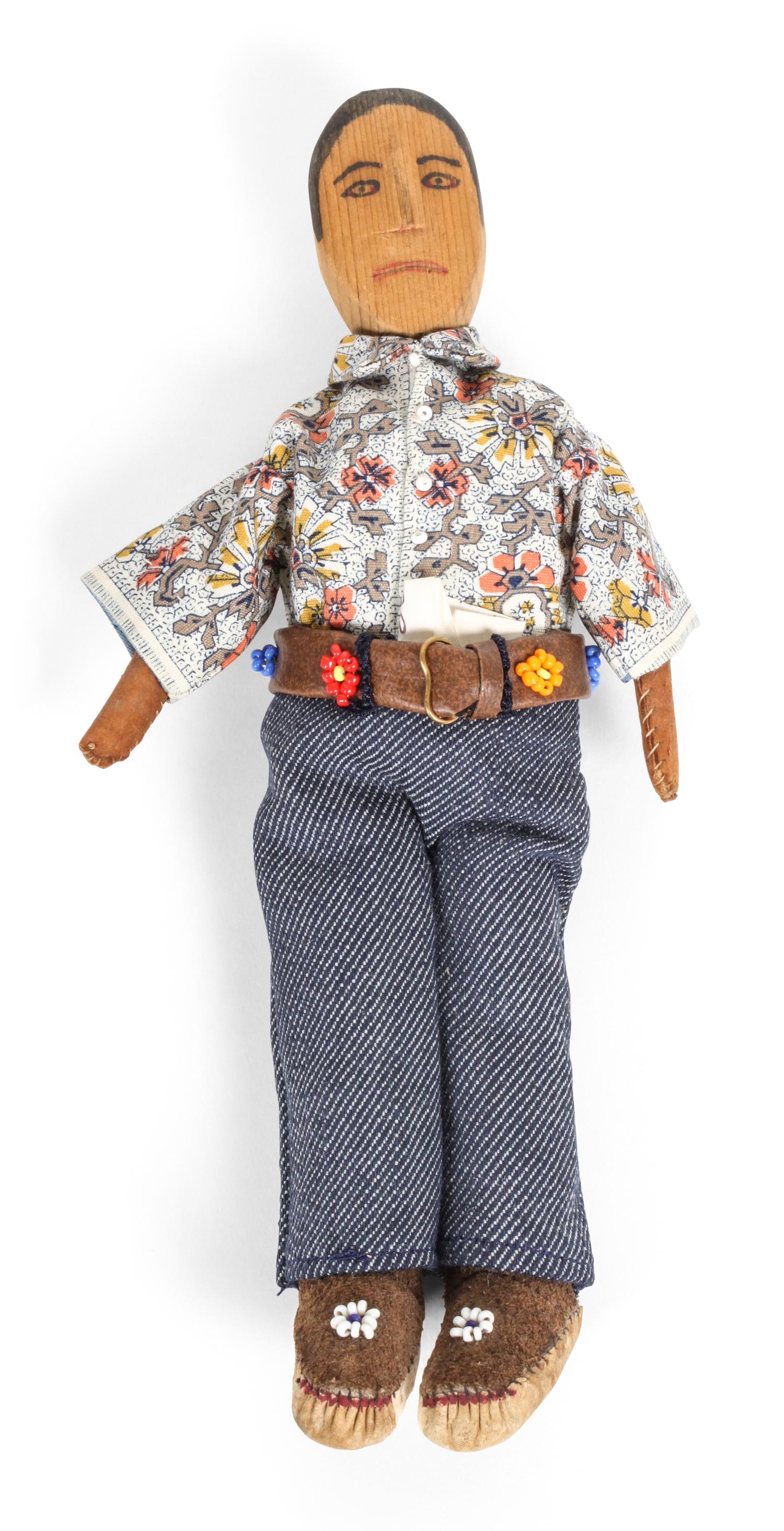Seven Various Dolls Depicting Indians Height of tallest 14 inches.