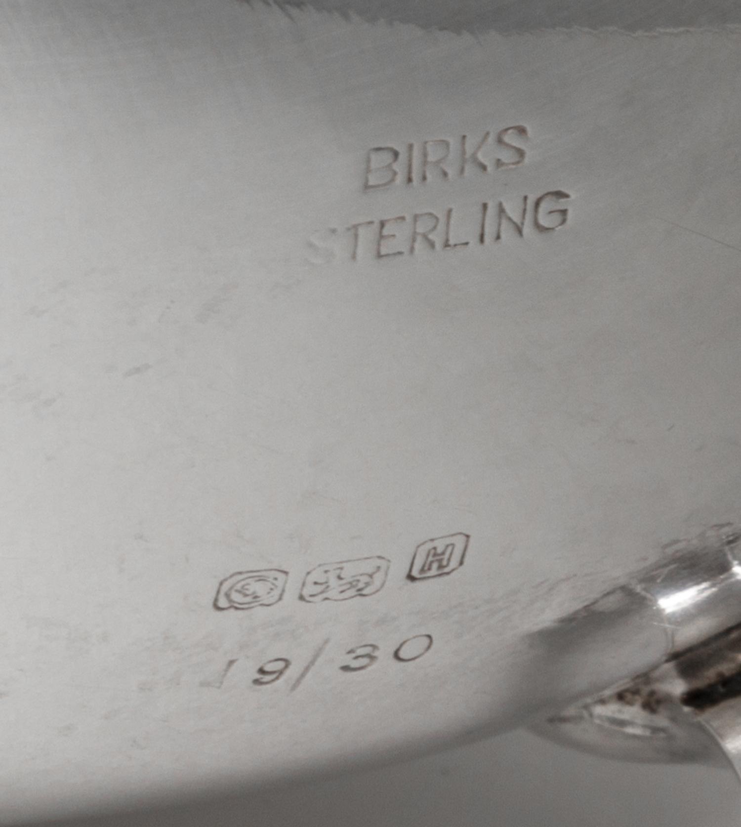 A Canadian Silver Sauce Boat, Henry Birks & Sons, Montreal, 20th Century, of typical form with a gadrooned border and leaf-capped flyin