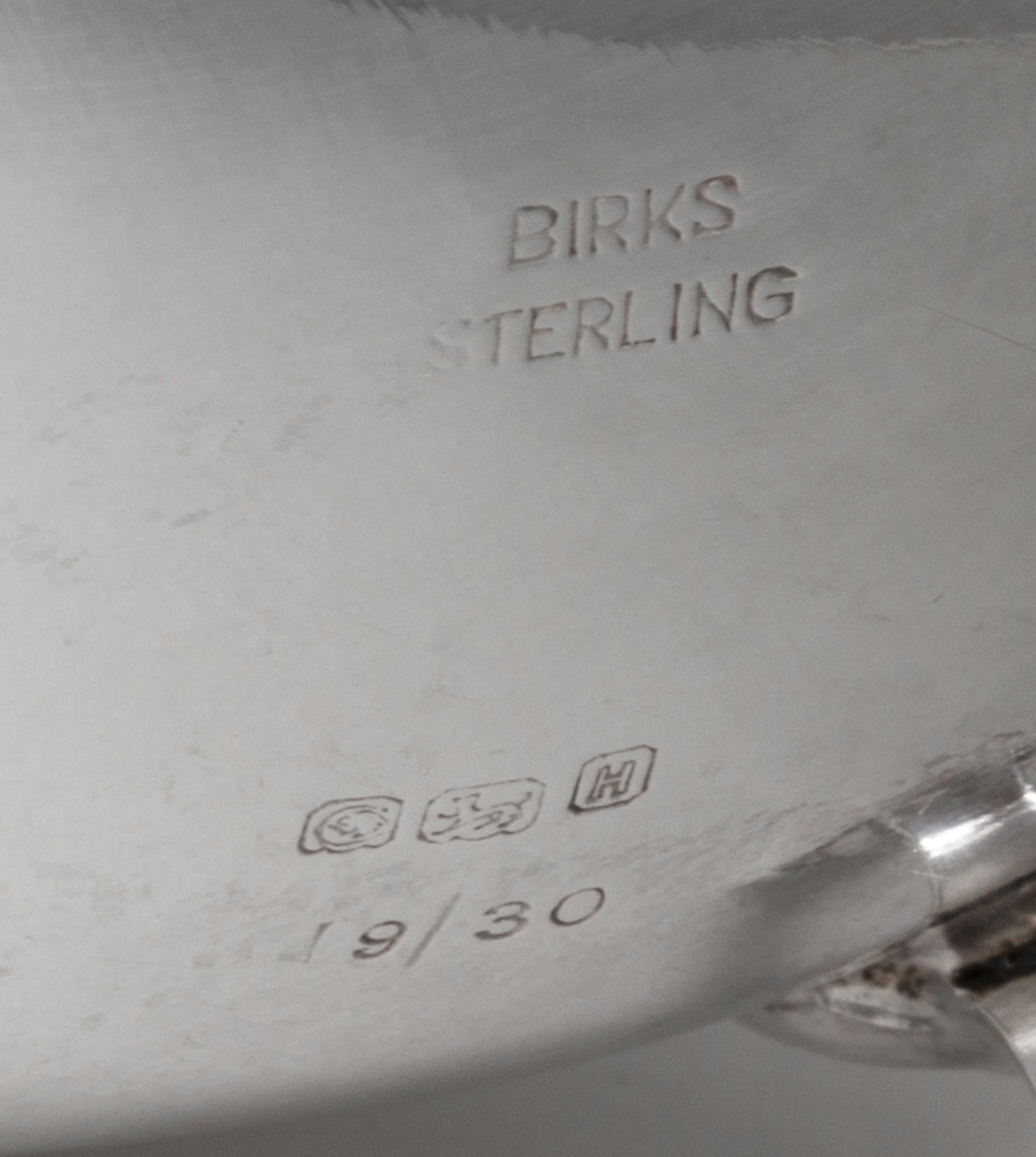 A Canadian Silver Sauce Boat, Henry Birks & Sons, Montreal, 20th Century, of typical form with a gadrooned border and leaf-capped flyin