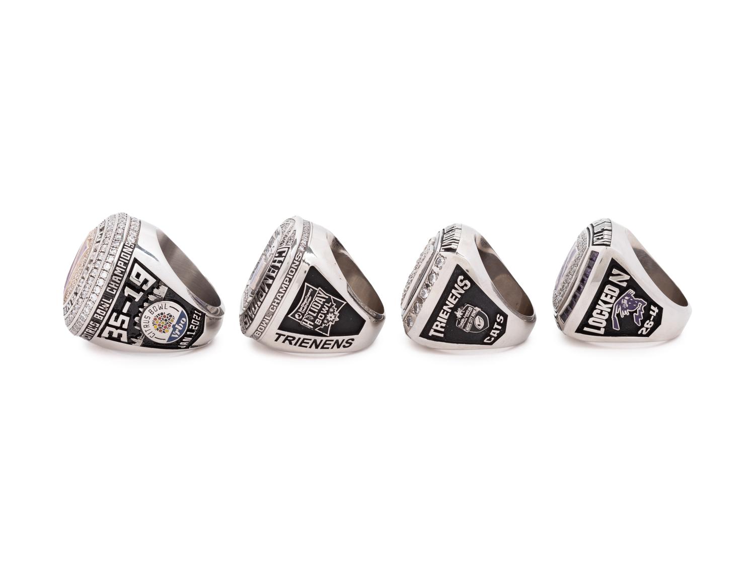 A Group of Four Northwestern University Football and Basketball Championship Rings,