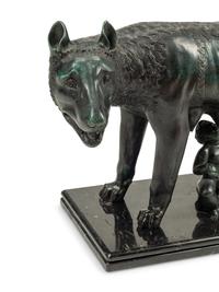 A Grand Tour Style Patinated Bronze Group of Lupa with Romulus and Remus