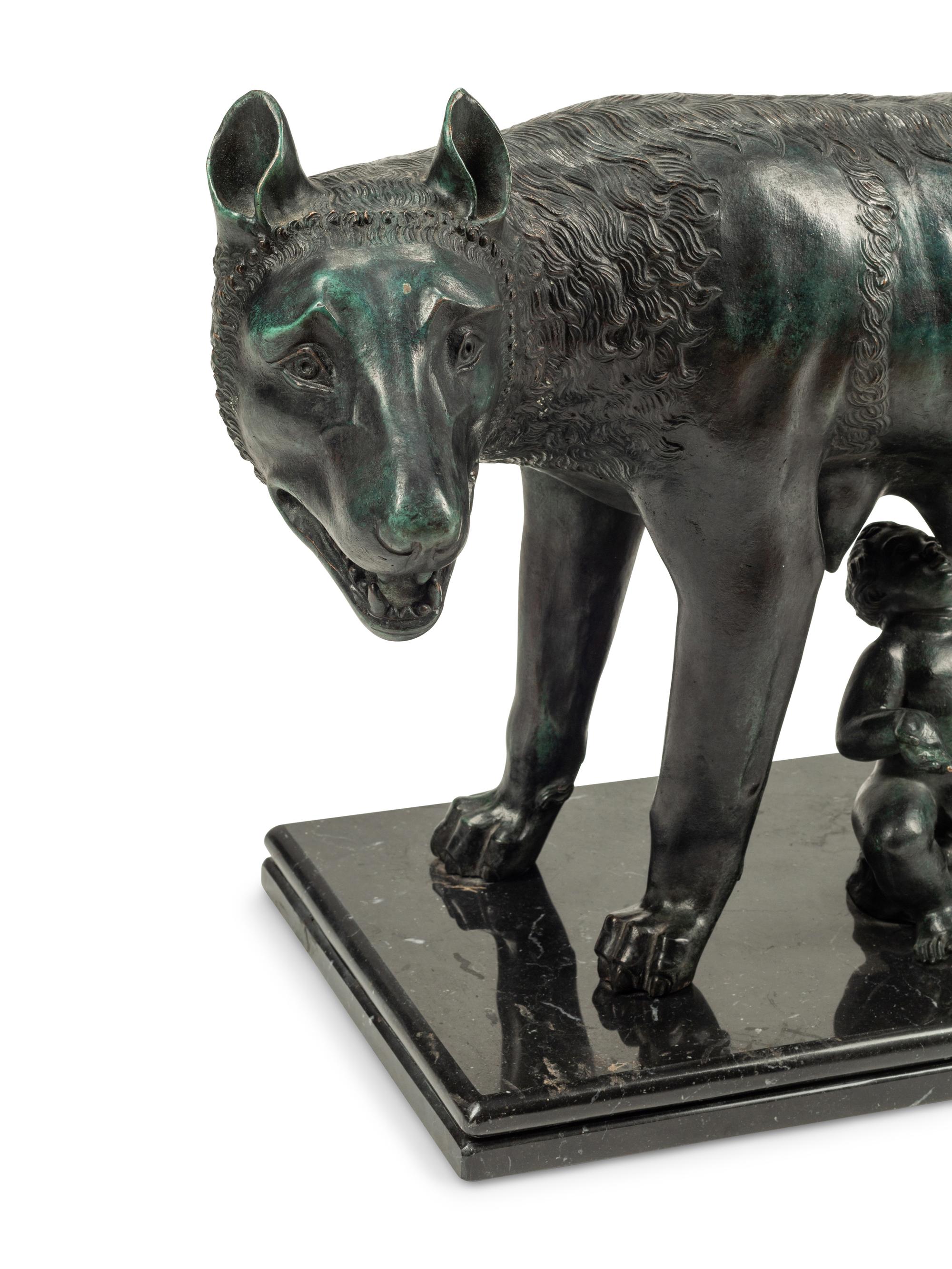 A Grand Tour Style Patinated Bronze Group of Lupa with Romulus and Remus