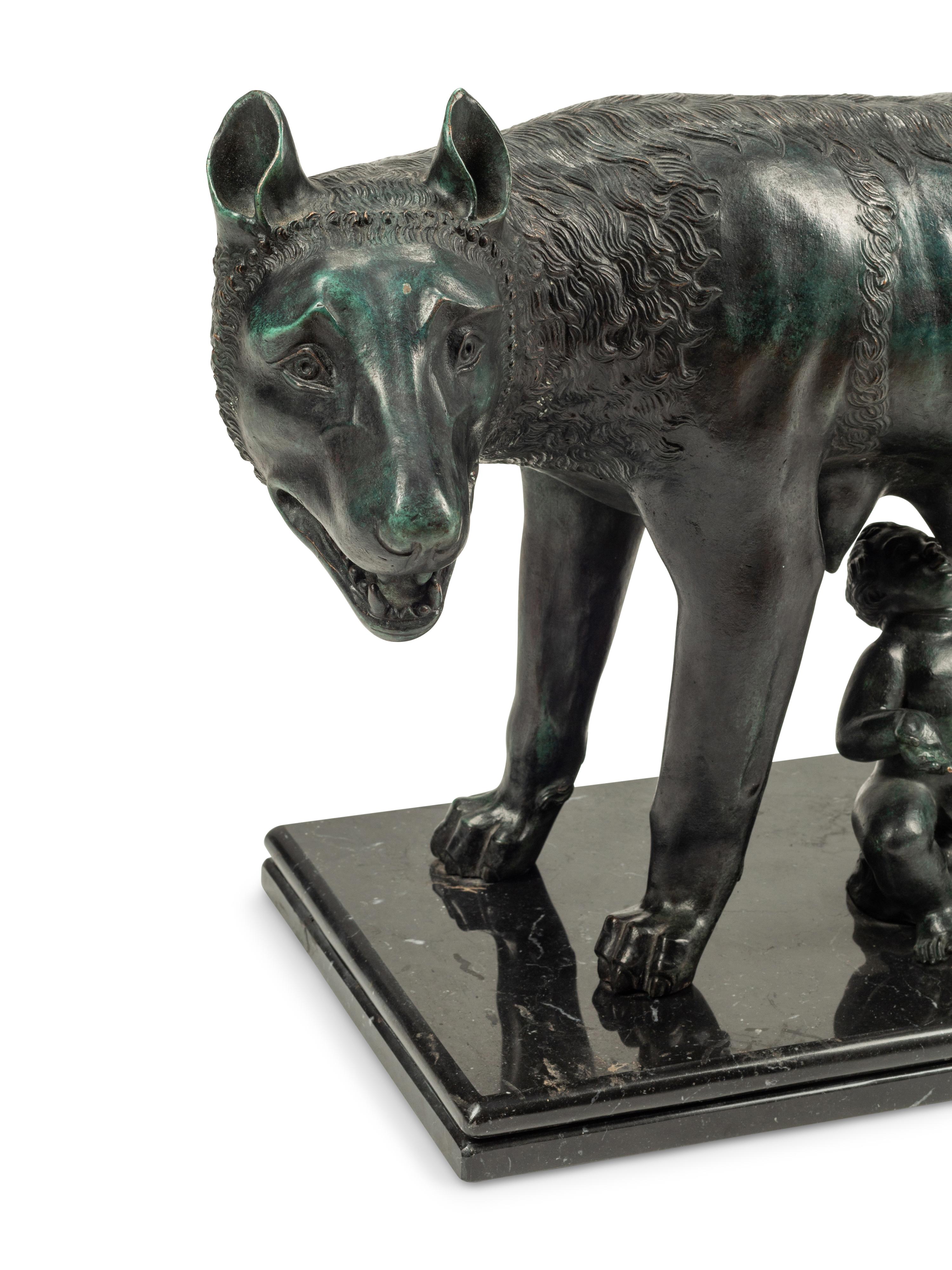 A Grand Tour Style Patinated Bronze Group of Lupa with Romulus and Remus