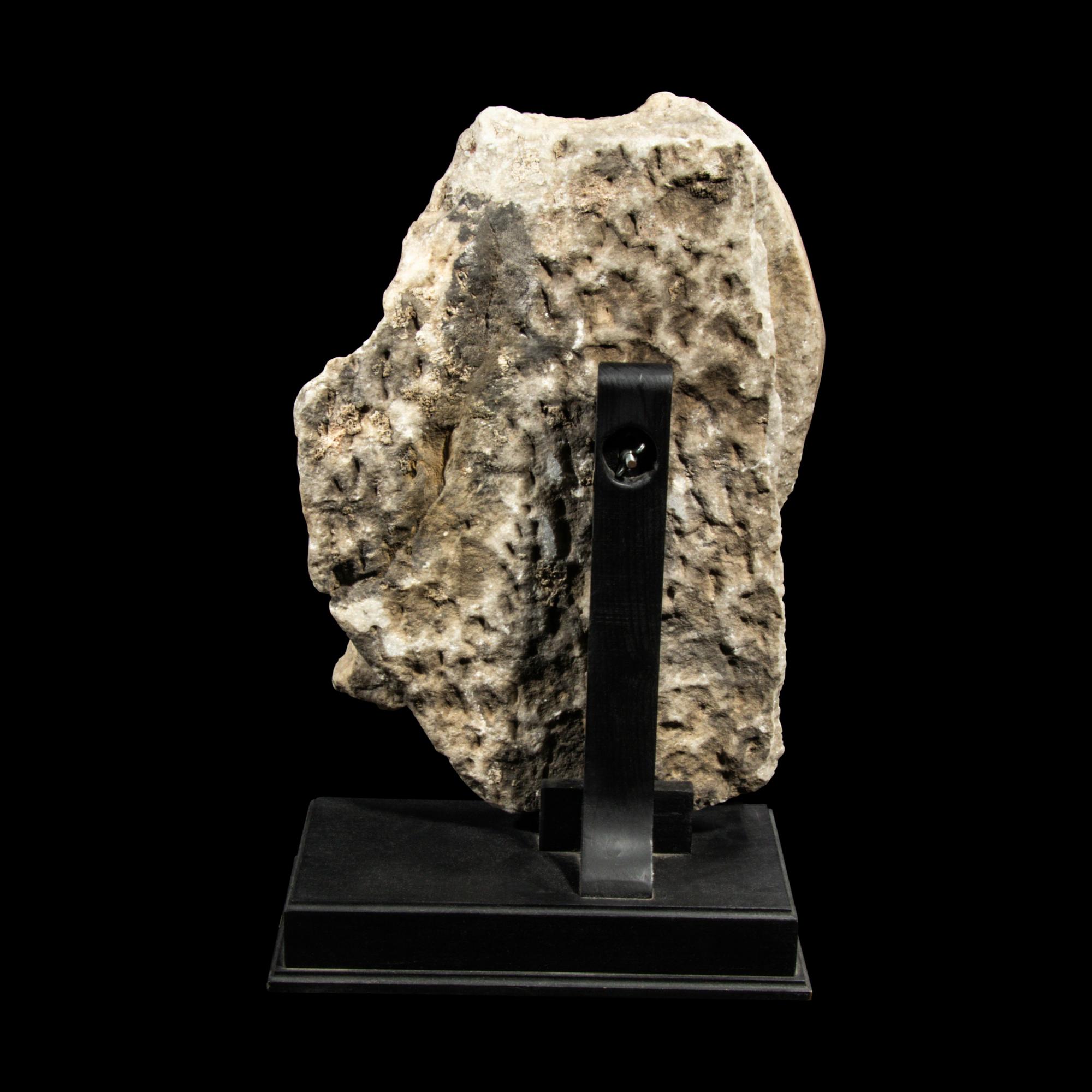 A Roman Marble Fragment of a Seated Offical