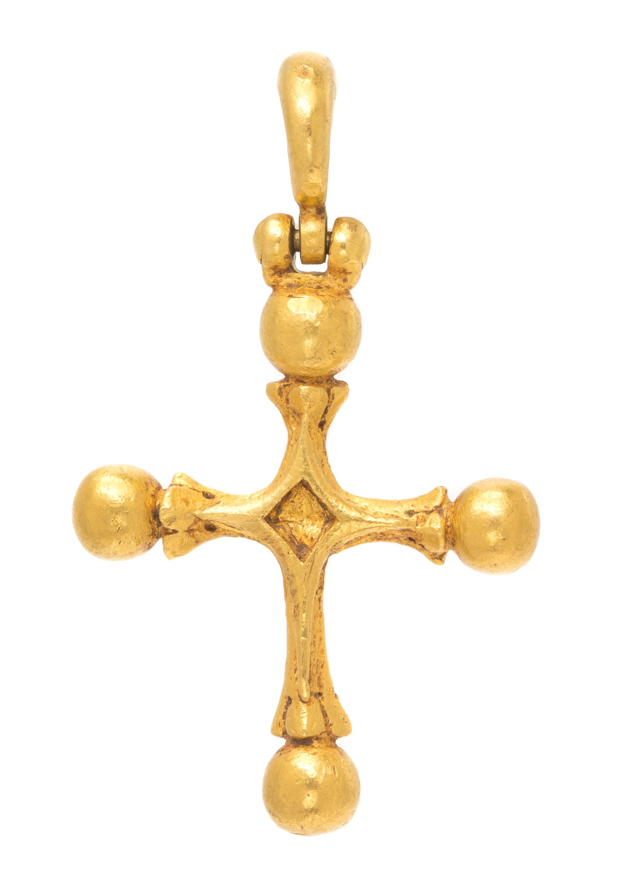A Sculpted Gold Cross Pendant, 16.90 dwts.