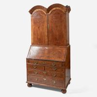 A William & Mary walnut double dome secretary bureau circa 1710