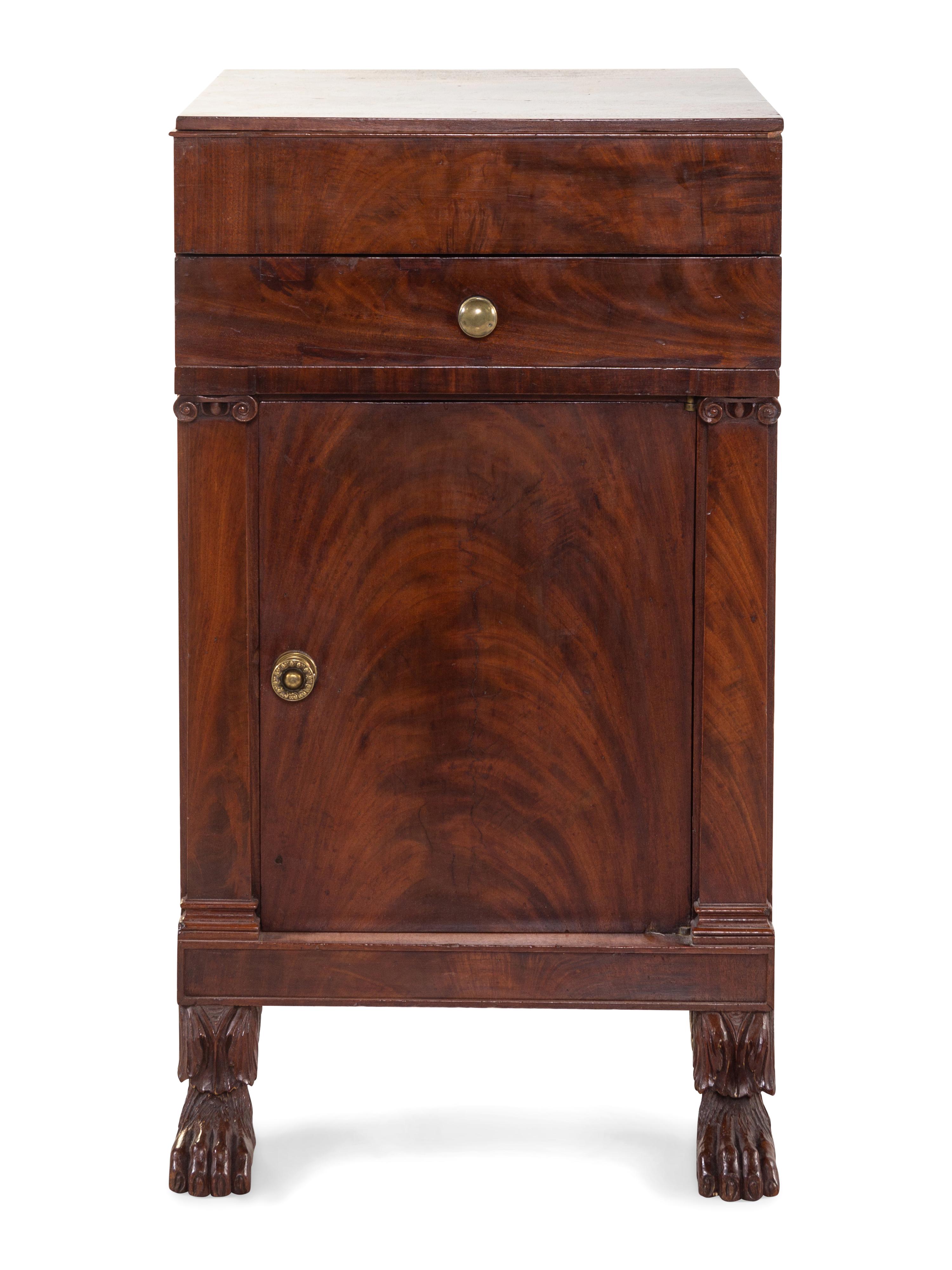 A Classical Carved and Figured Mahogany Commode Cabinet