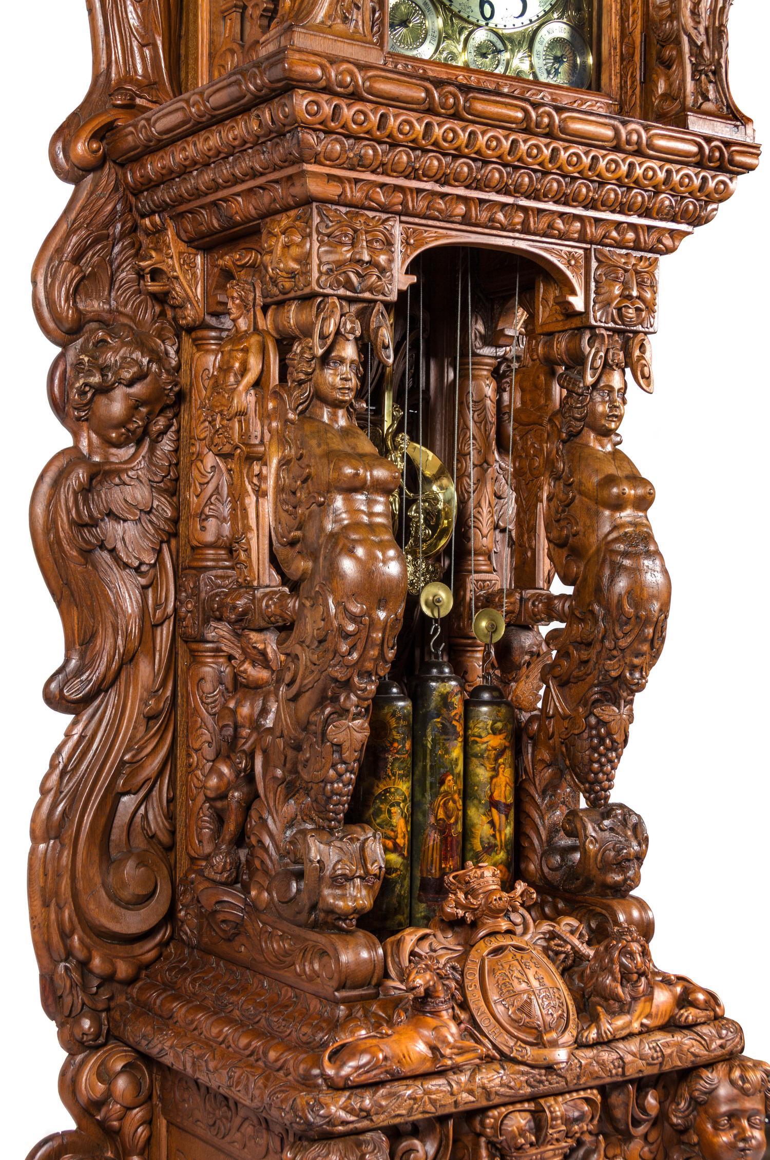 A Monumental English Carved Oak Tall Case Clock, LAST QUARTER 19TH CENTURY, Height 130 1/2 x width 48 x depth 33 inches. — LAST QUARTER 19TH CENTURY,