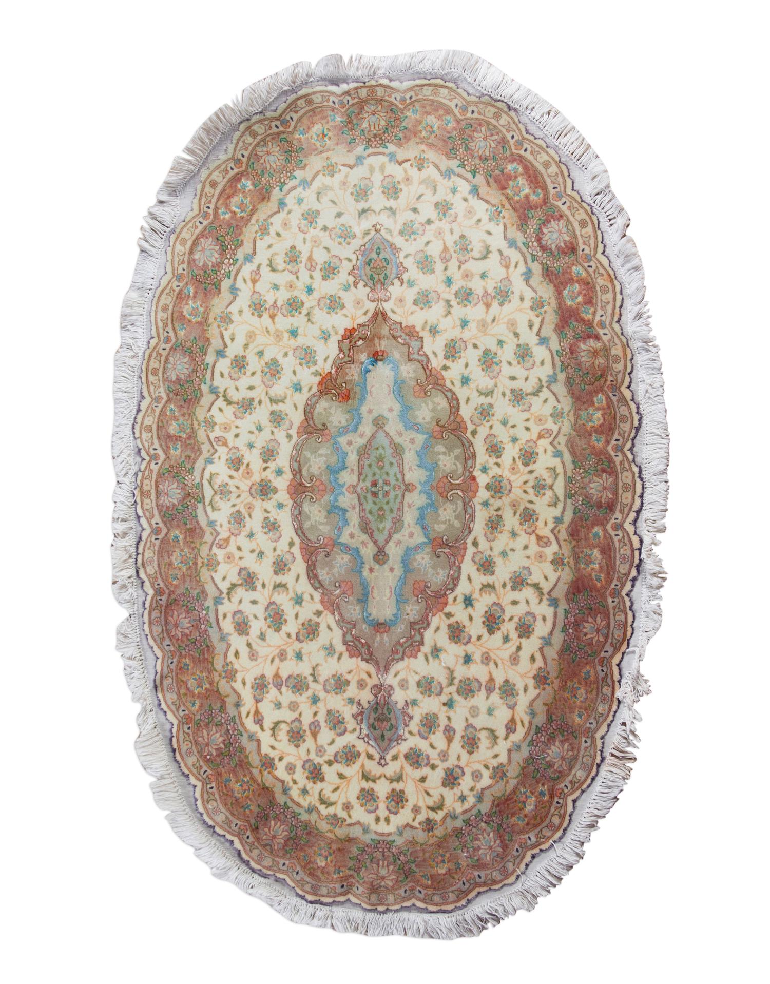 A Tabriz Wool and Silk Rug
