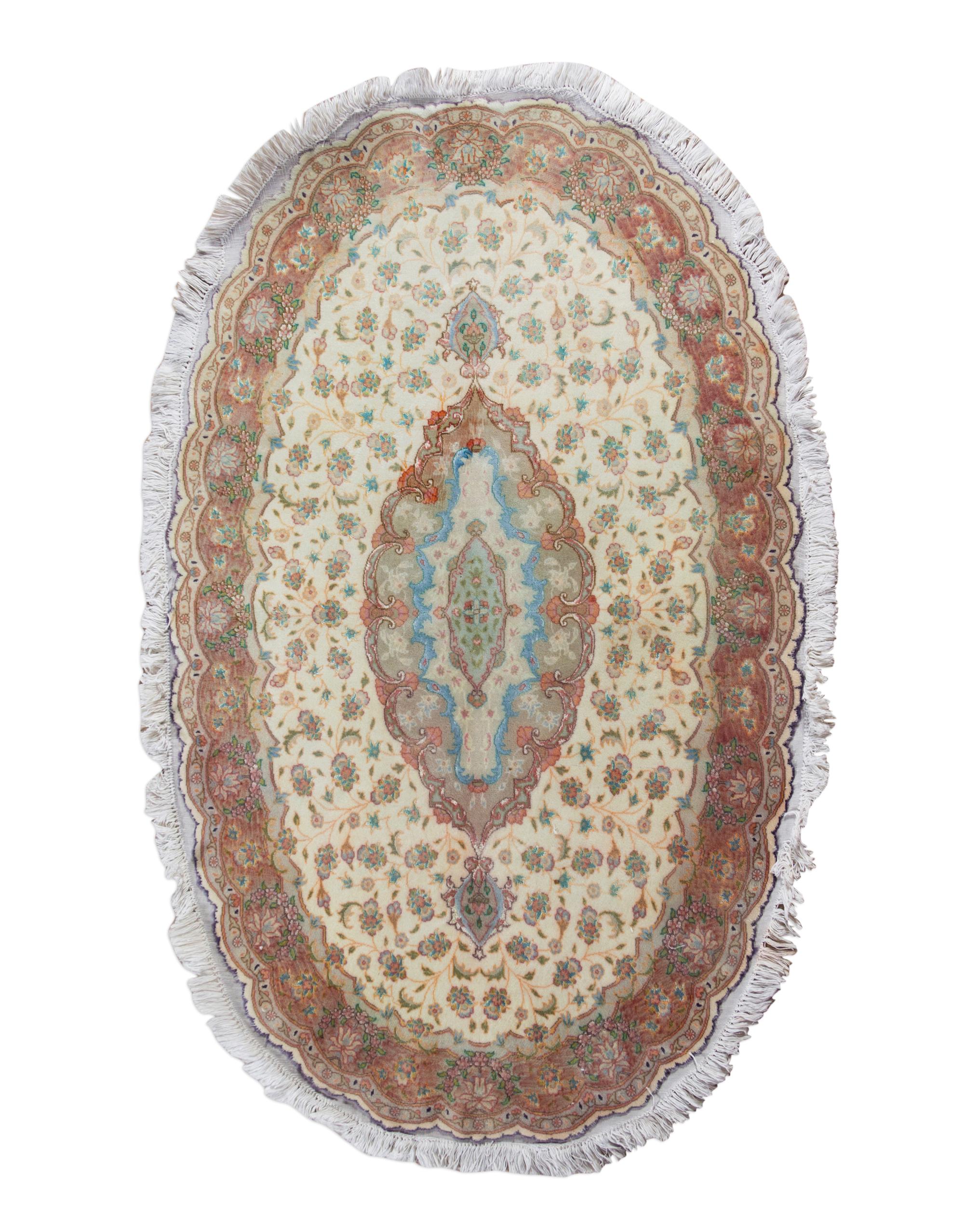 A Tabriz Wool and Silk Rug