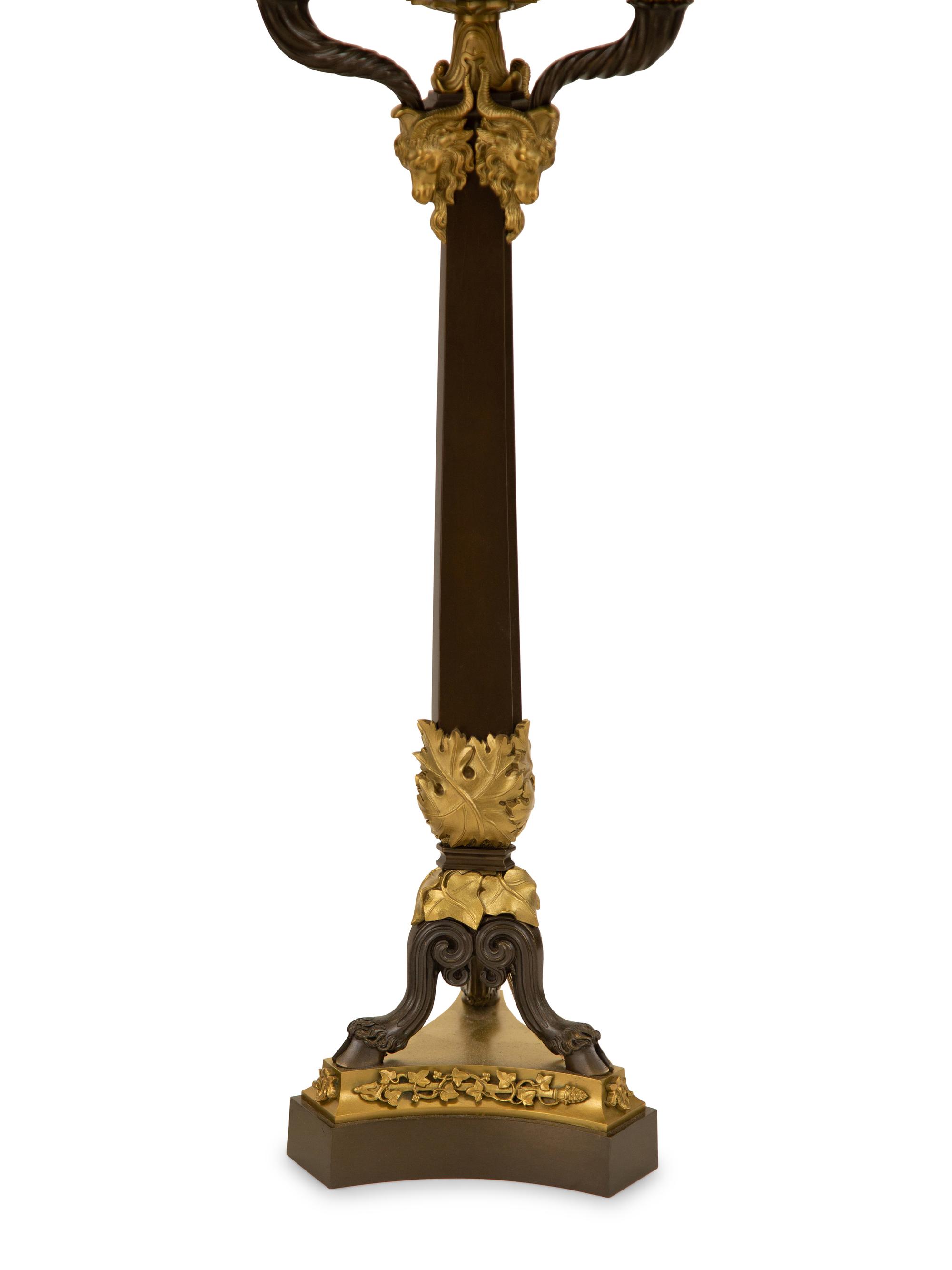 A Pair of Empire Style Ebonized and Gilt Bronze Four-Light Candelabra Mounted as Lamps — 19th/20th Century